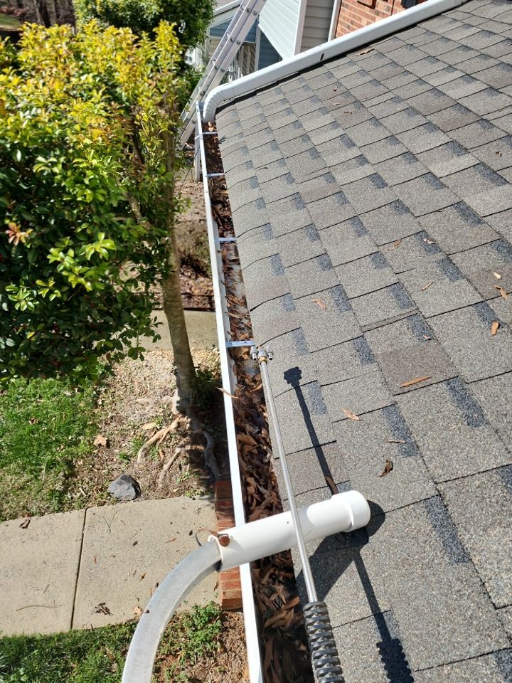 Gutter Cleaning using water by Power Wash Masters LLC