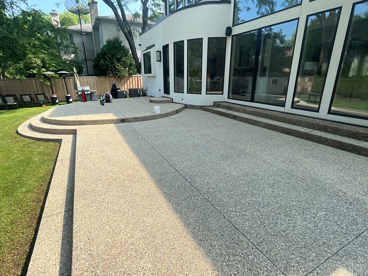 Aggregate concrete cleaning and sealing using Surebond SB-9000 by Northern Power Washing LLC.