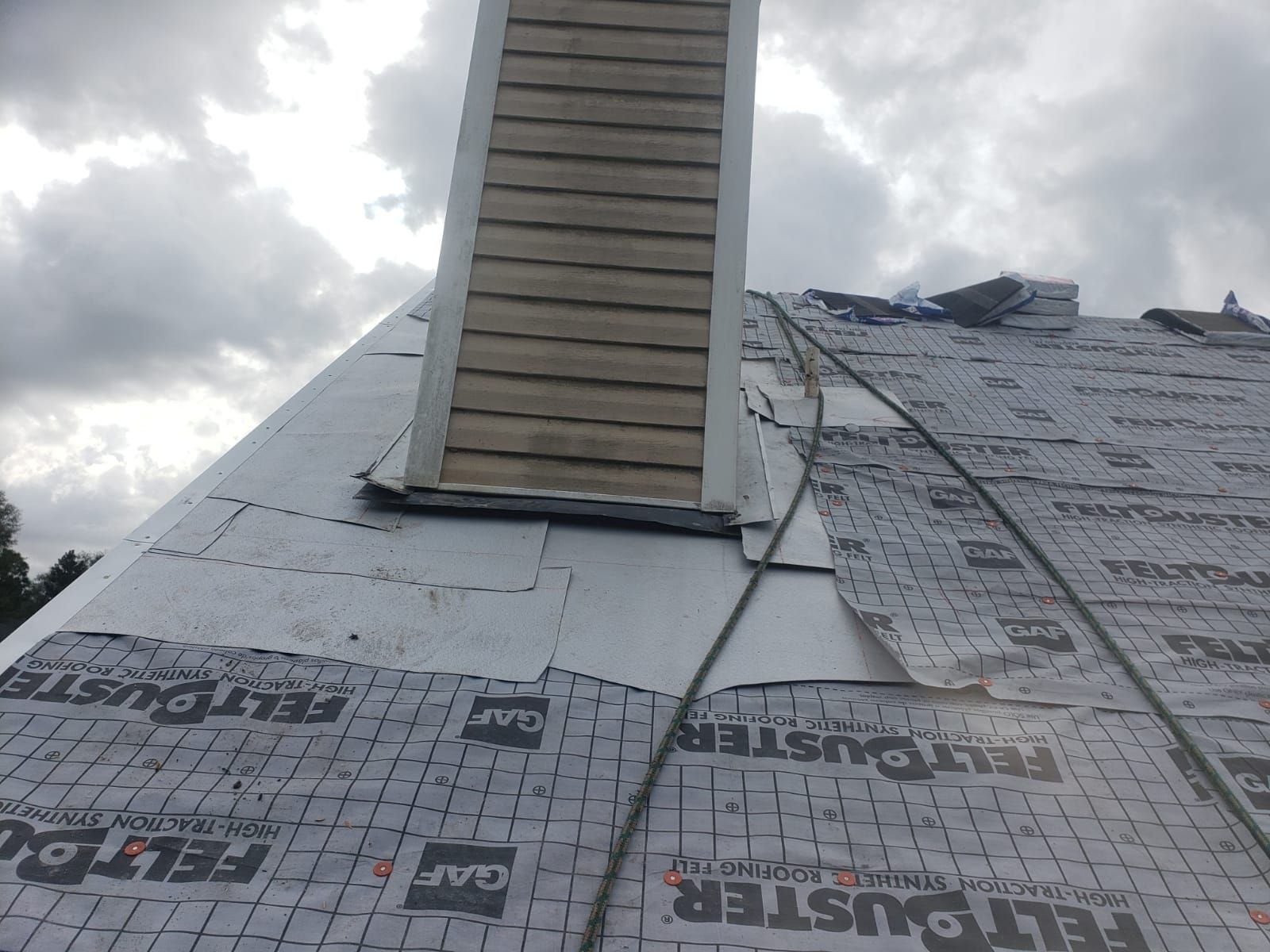Residential Roofing Installation using Roof Replacement by American Roofing & Construction LLC
