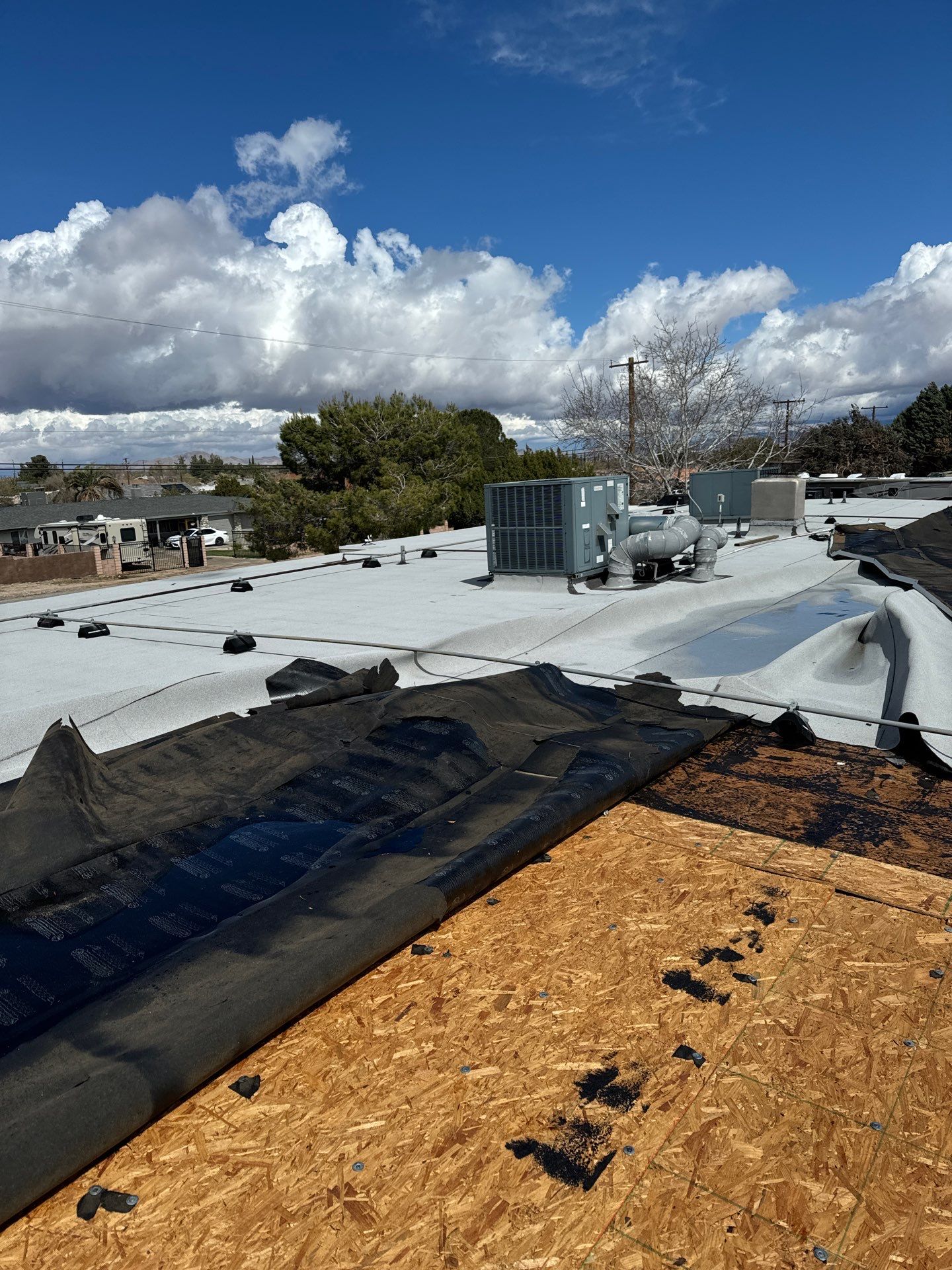 Storm took out this roof in Hesperia, CA by Innova Air & Heat