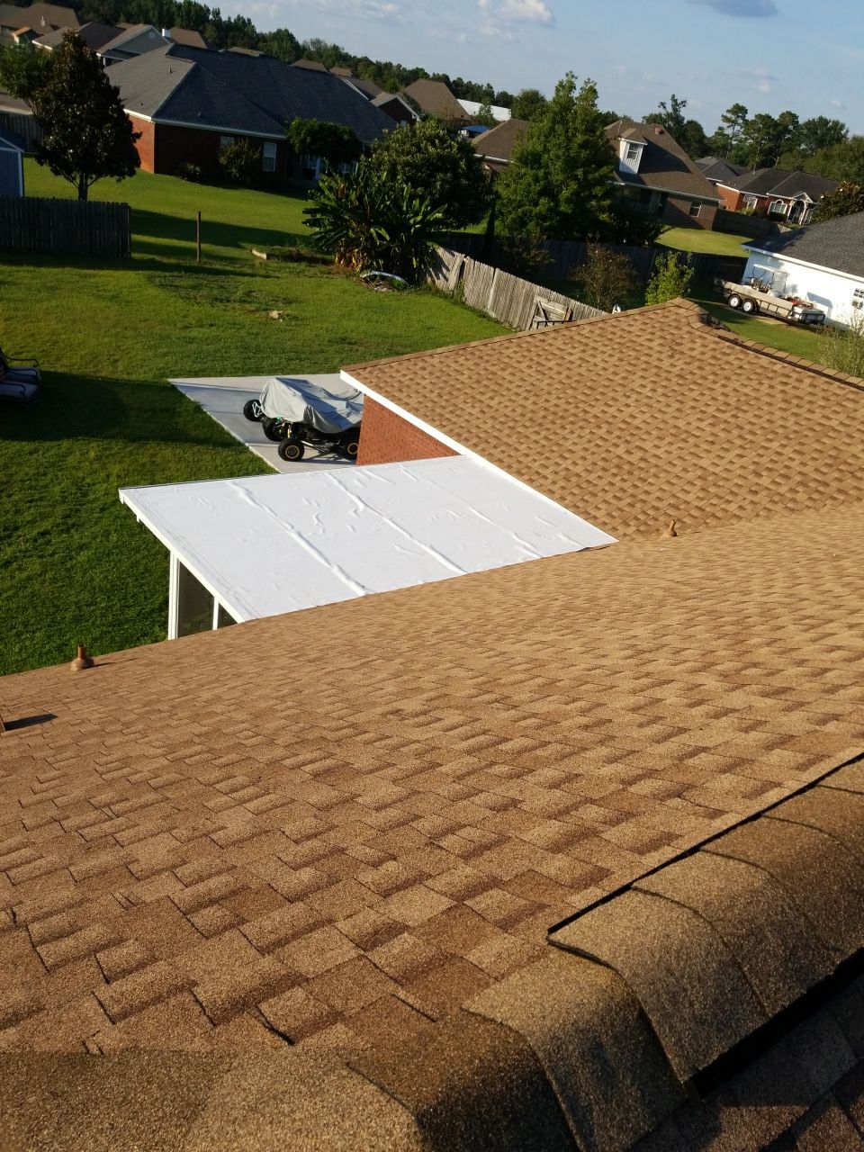 Residential Roofing Installation using Roof Replacement by American Roofing & Construction LLC
