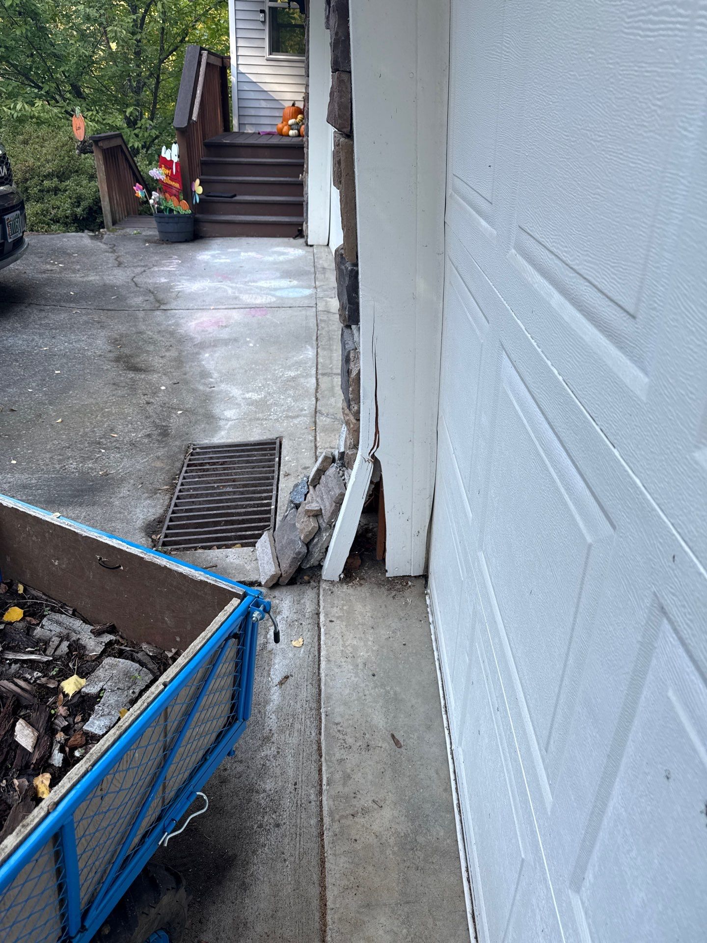 Damascus Garage Exterior Repair and Stacked Stone Veneer Installation by American Made Construction 