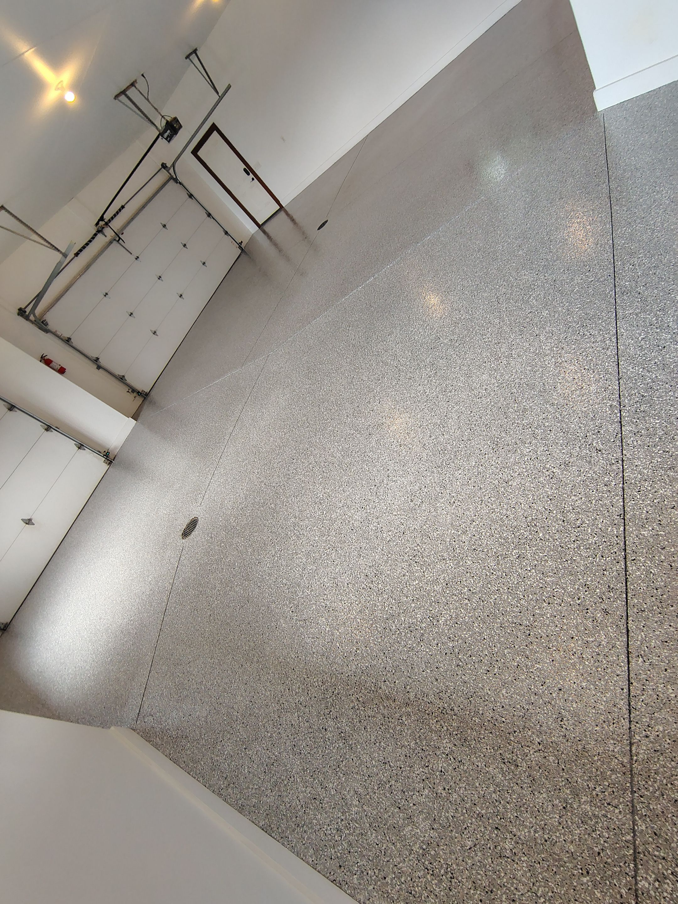 Feather Grey Floor Coating in Sioux Falls, SD by Select Painting, Coatings & Garage Cabinets