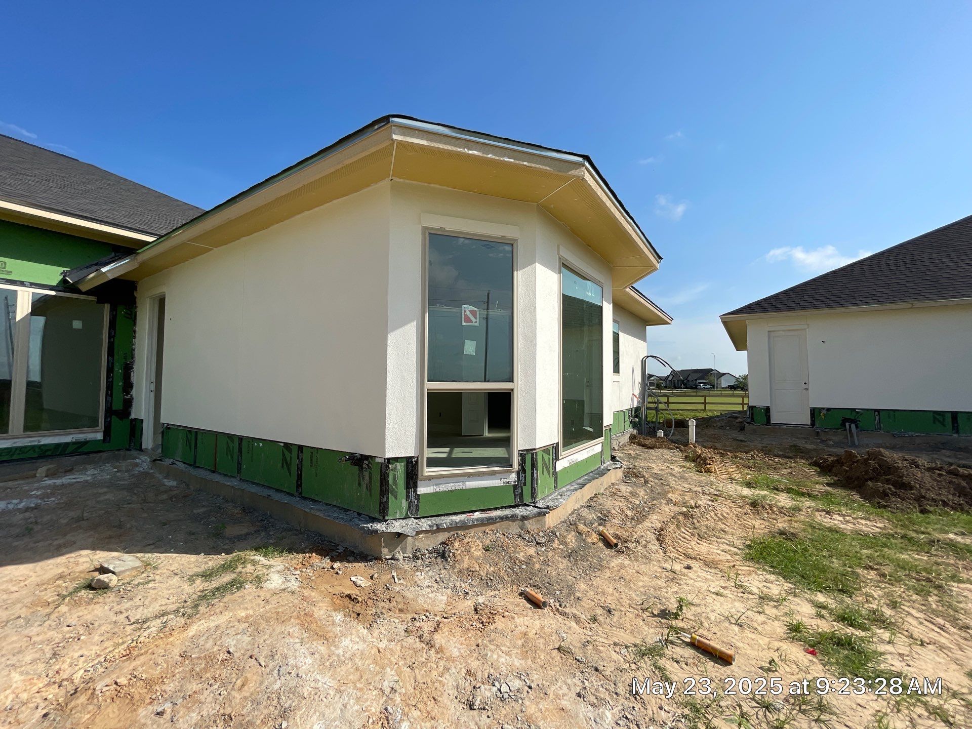 Waller Estate Elegance: Apex Stucco with Grand Stone Accents by Apex Conventional Stucco Llc