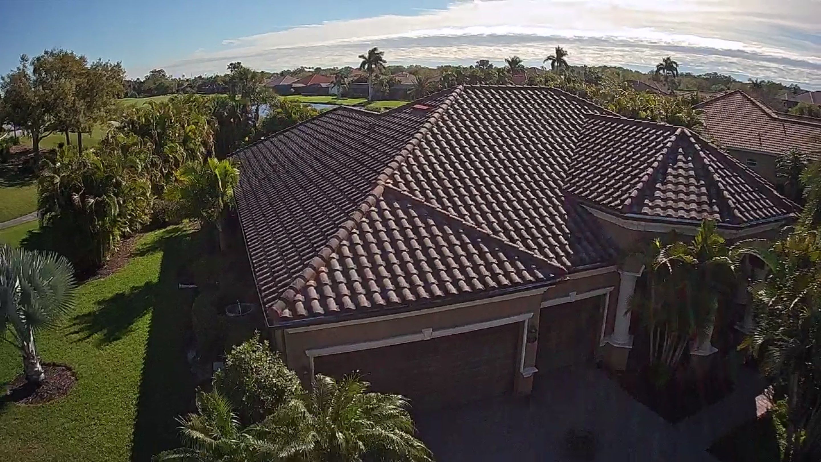 This project focused on a full gutter clean-out to restore proper water flow and prevent overflow issues.  Our scope of work included: 	•	Removing heavy leaf and pollen buildup from the gutter system 	•	Clearing out clogged sections along the rear gutters near the pool cage, where debris tends to accumulate more heavily 	•	Inspecting and cleaning the front gutter guards, which had several blocked areas restricting water flow 	•	Ensuring all downspouts and channels were flowing properly after service  Even with gutter guards installed, debris like pollen, shingle grit, and fine organic matter can still build up over time—especially in Florida’s environment. Regular maintenance helps prevent water damage, overflow, and staining on exterior surfaces.  Another thorough job completed by Sunshine AquaWash® – keeping homes protected from top to bottom. by Sunshine AquaWash