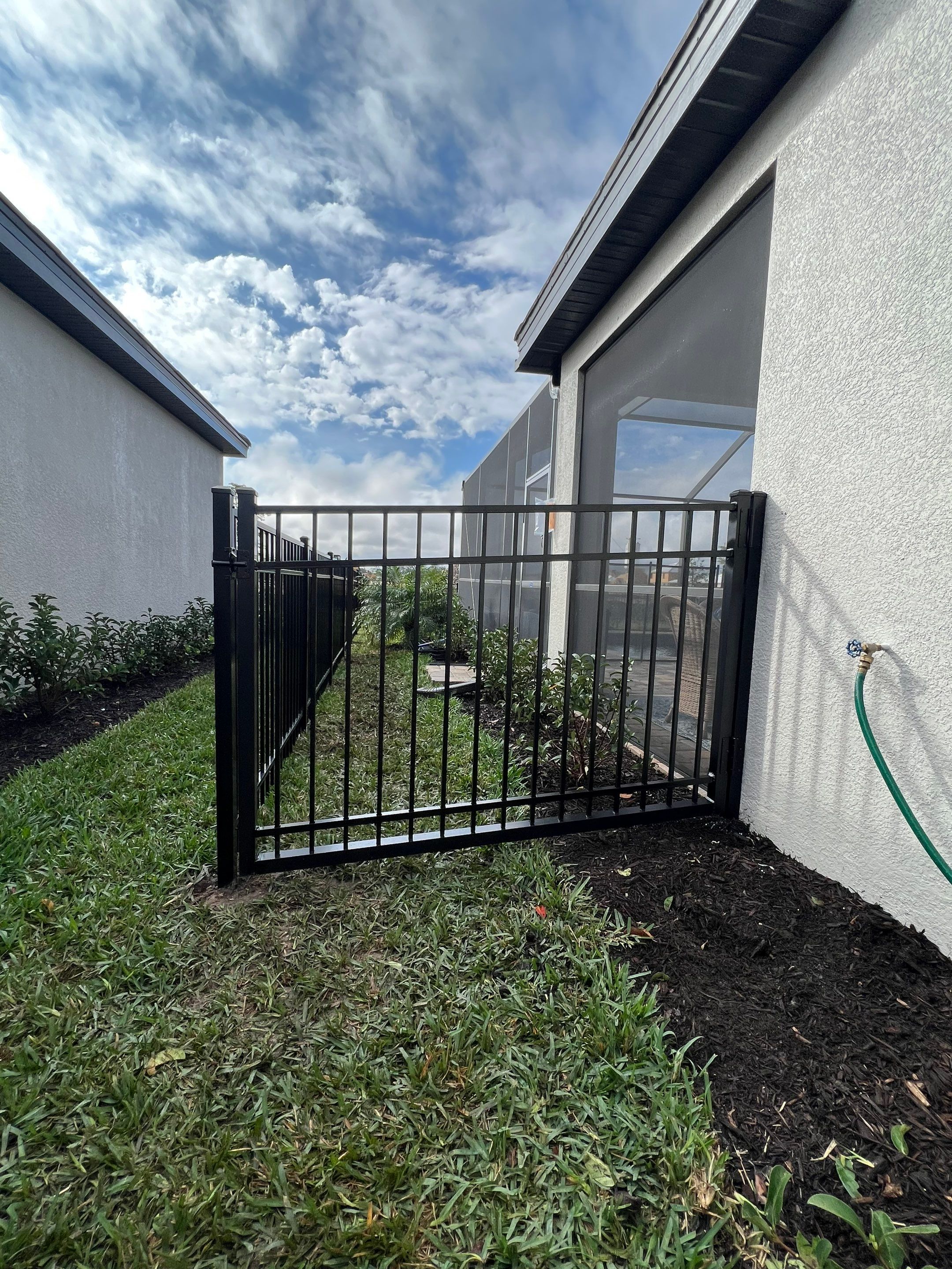 Aluminum Fence Installation using Black 3 Rail Aluminum Fence by Asap fence and gates, LLC