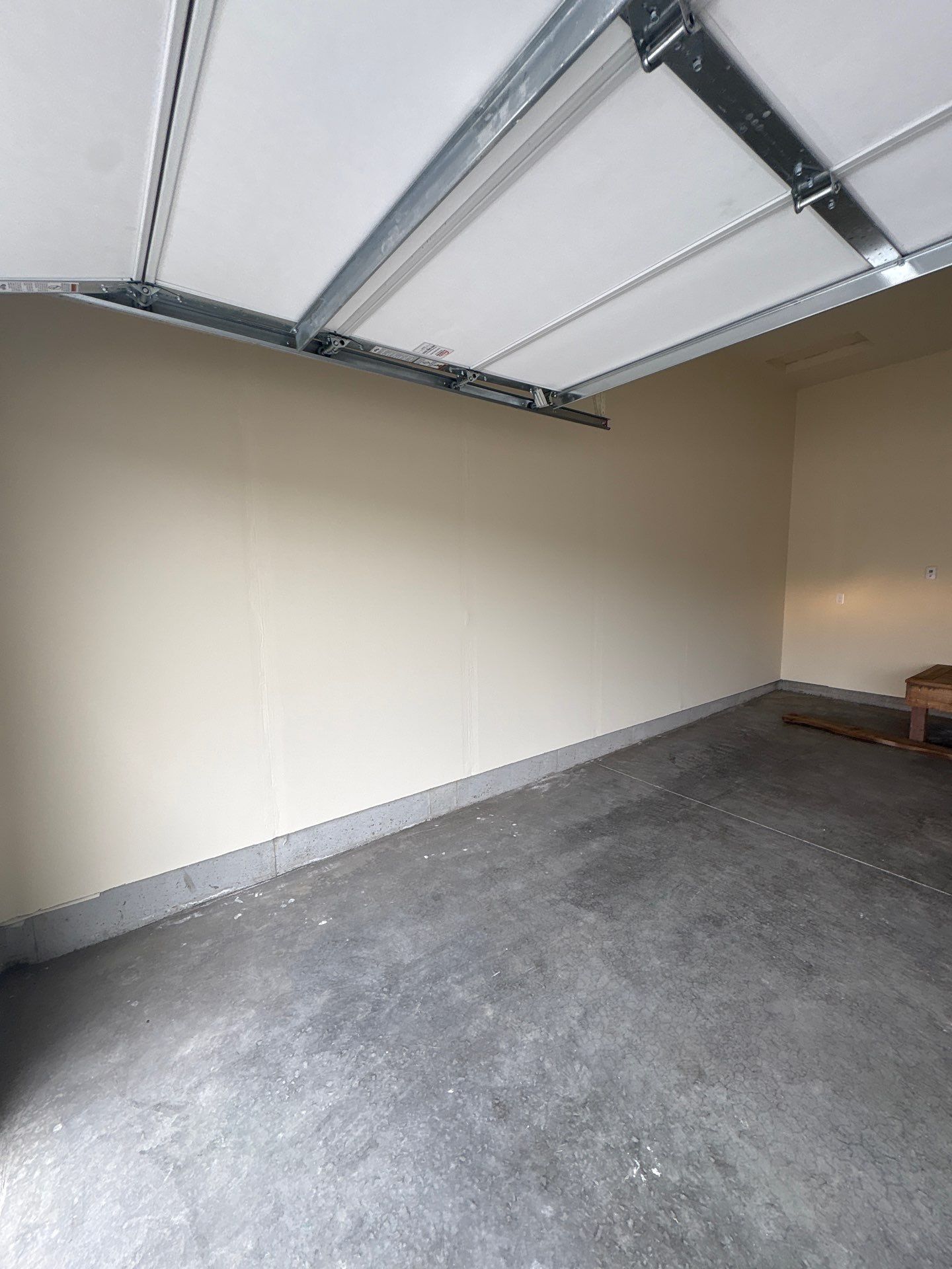 Garage Interior Finishing and Custom Wood Step Construction in Sioux Falls by Select Painting, Coatings & Garage Cabinets