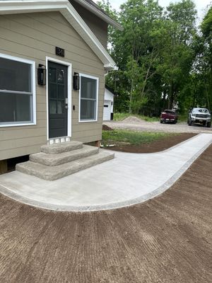 Broom finished concrete patio and sidewalk