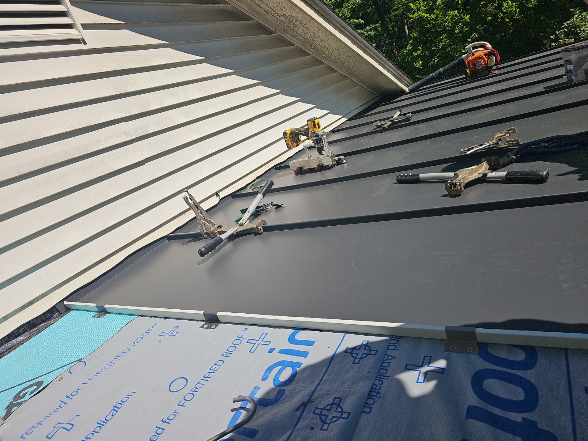 Metal Roof Replacement by Winchester Roofing