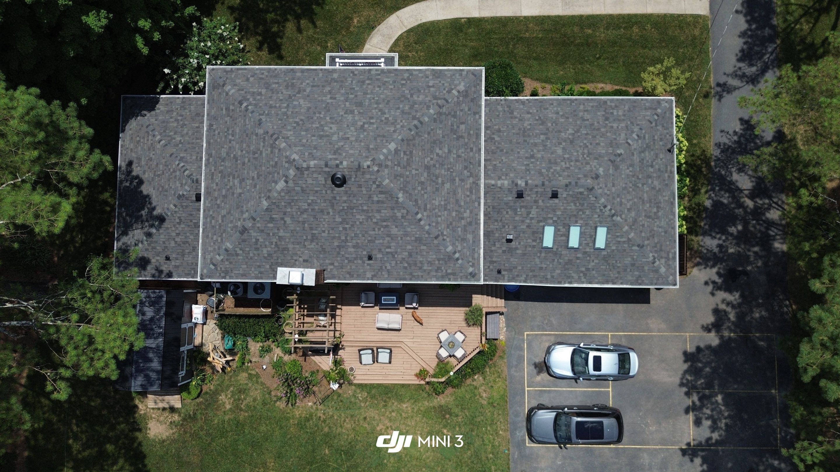 Full Roof Replacement and Skylight Installation for Franklin Colonial Home by Shinglesmiths Roofing