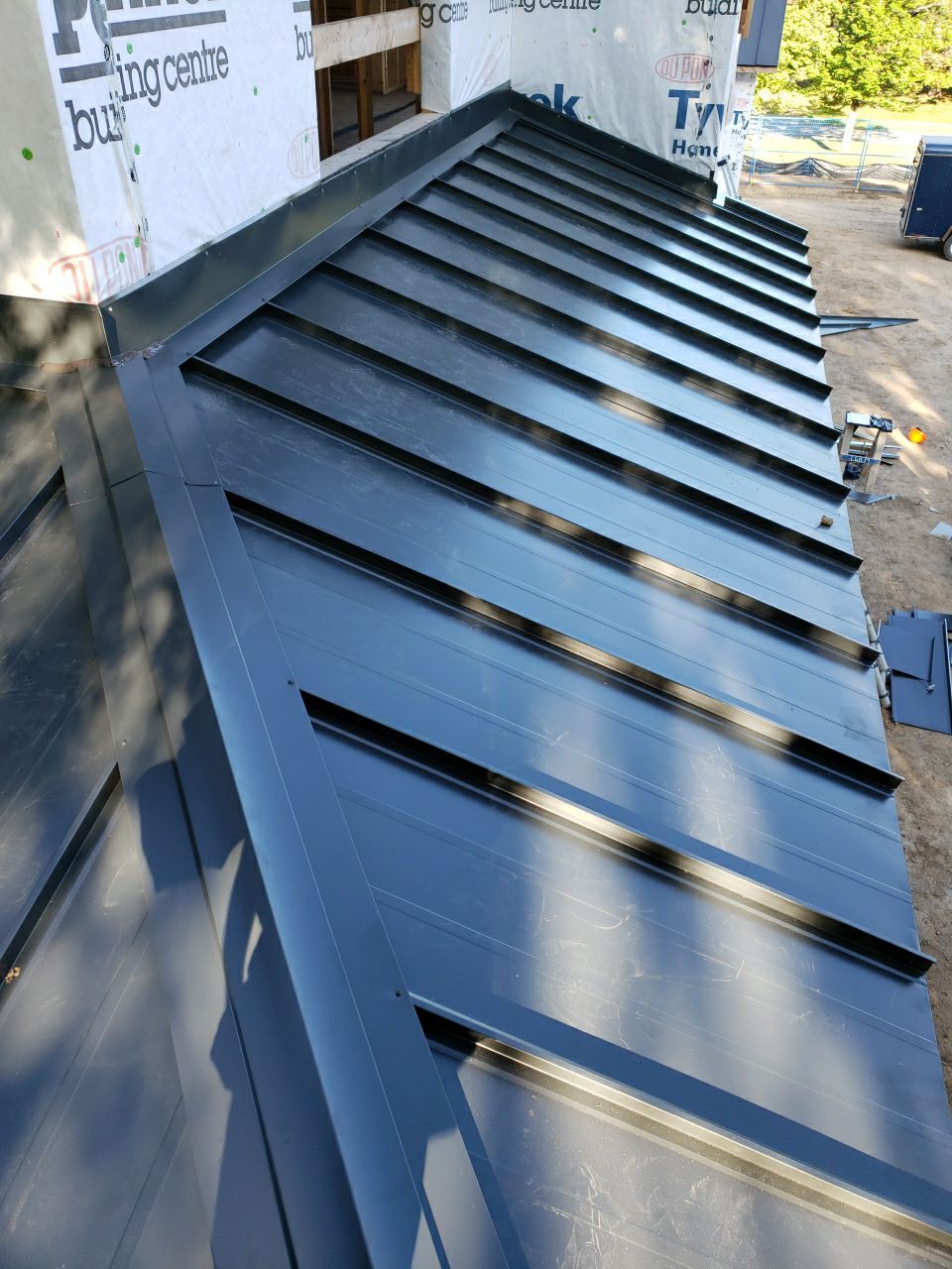 New Home Construction using 16" Standing Seam Panels by Jay Carter Roofing & Sheet Metal