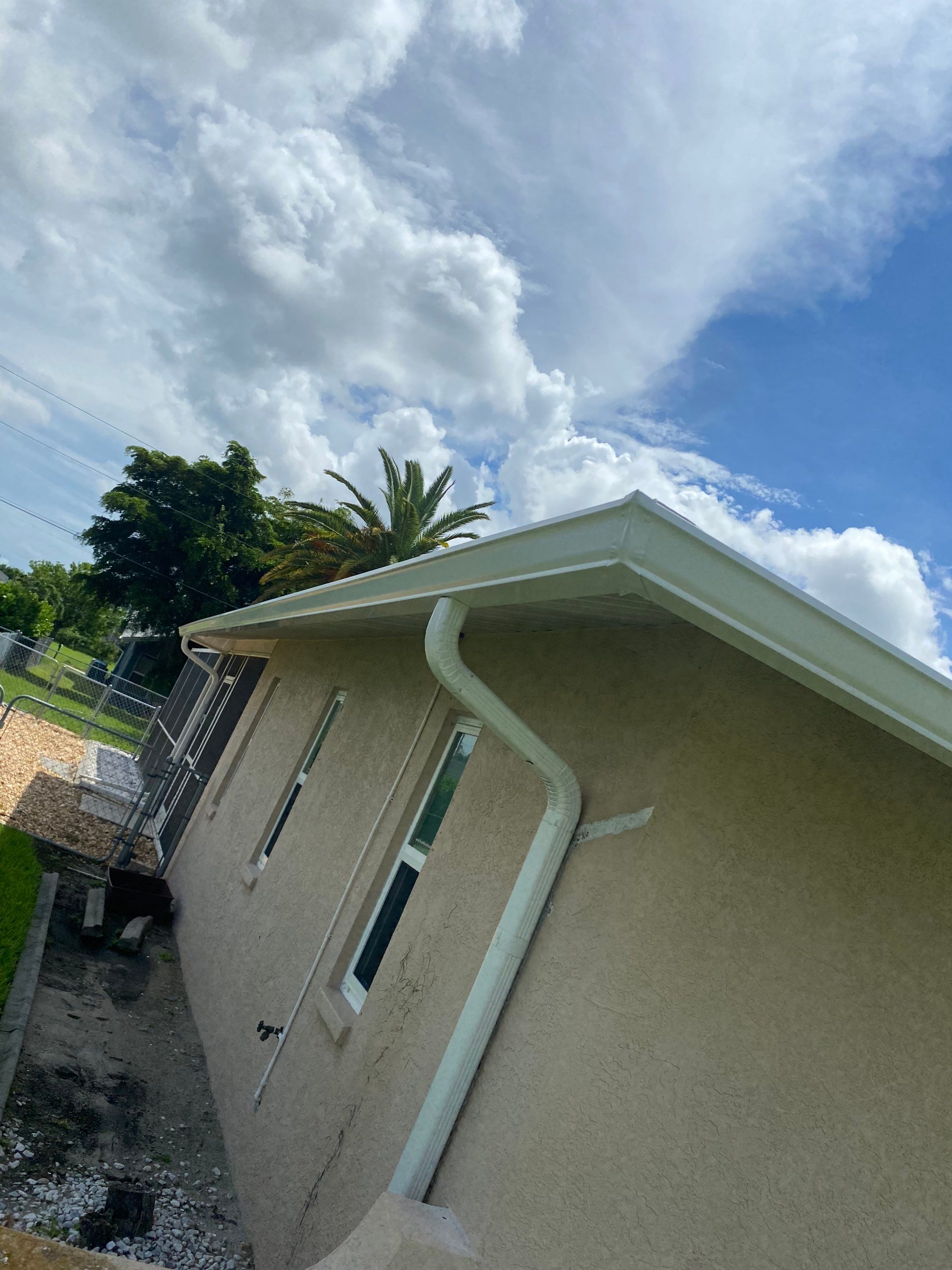 Seamless Gutters for Buildings in Cape Coral FL by Gutter Professors