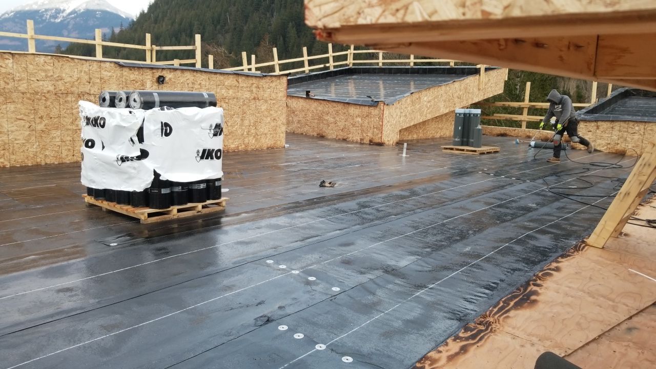 Commercial Roofing Installation using IKO 2ply sbs  by Top Notch Roofing Inc