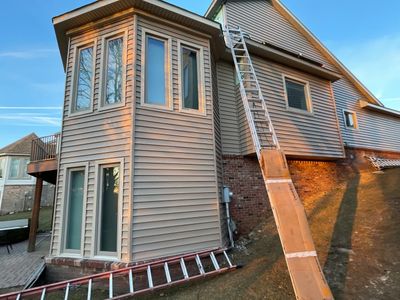 Siding Replacement using CertainTeed Monogram D5 Clapboard