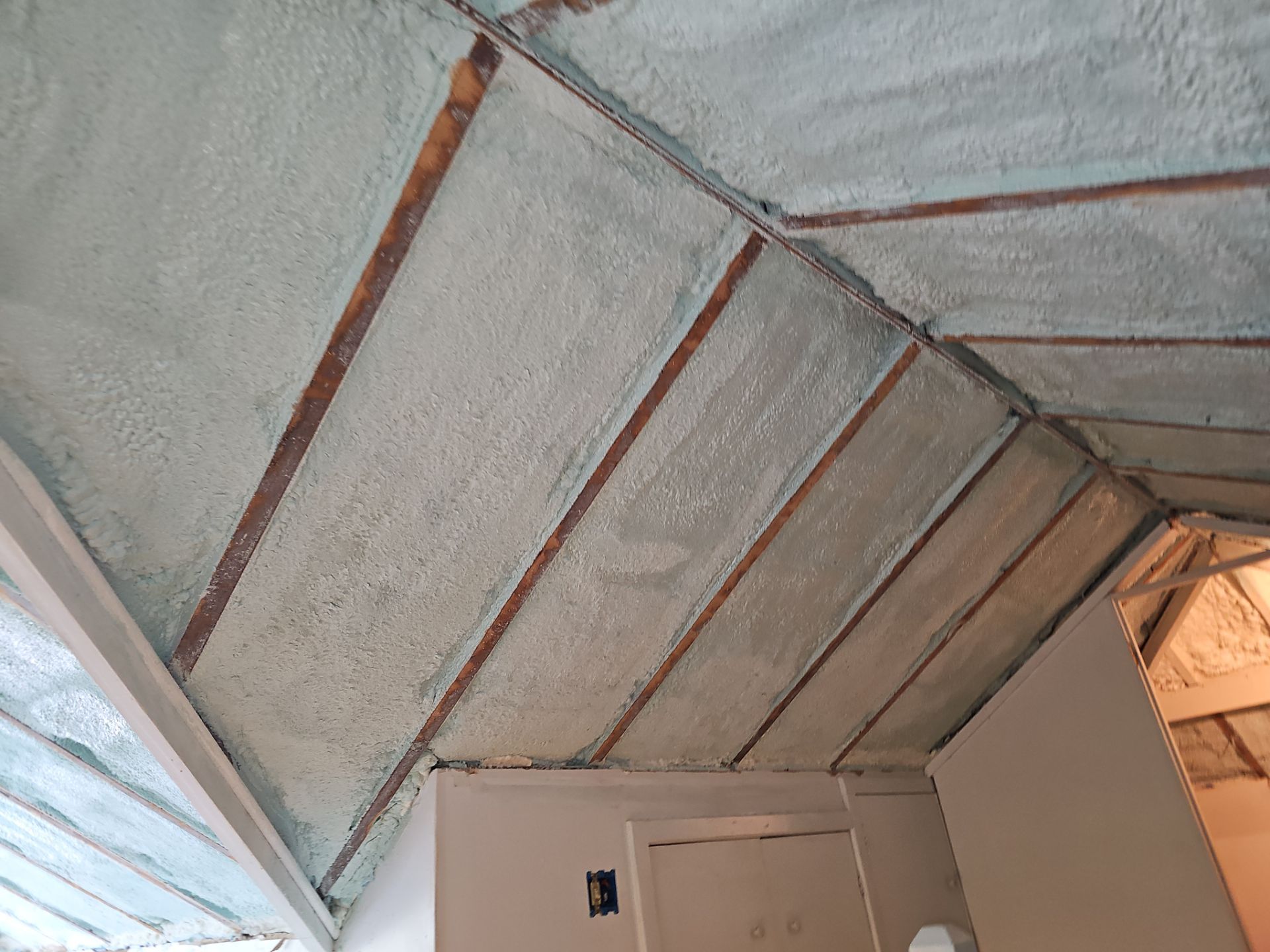 Attic Insulation using open cell spray foam by NYS Foam & Energy