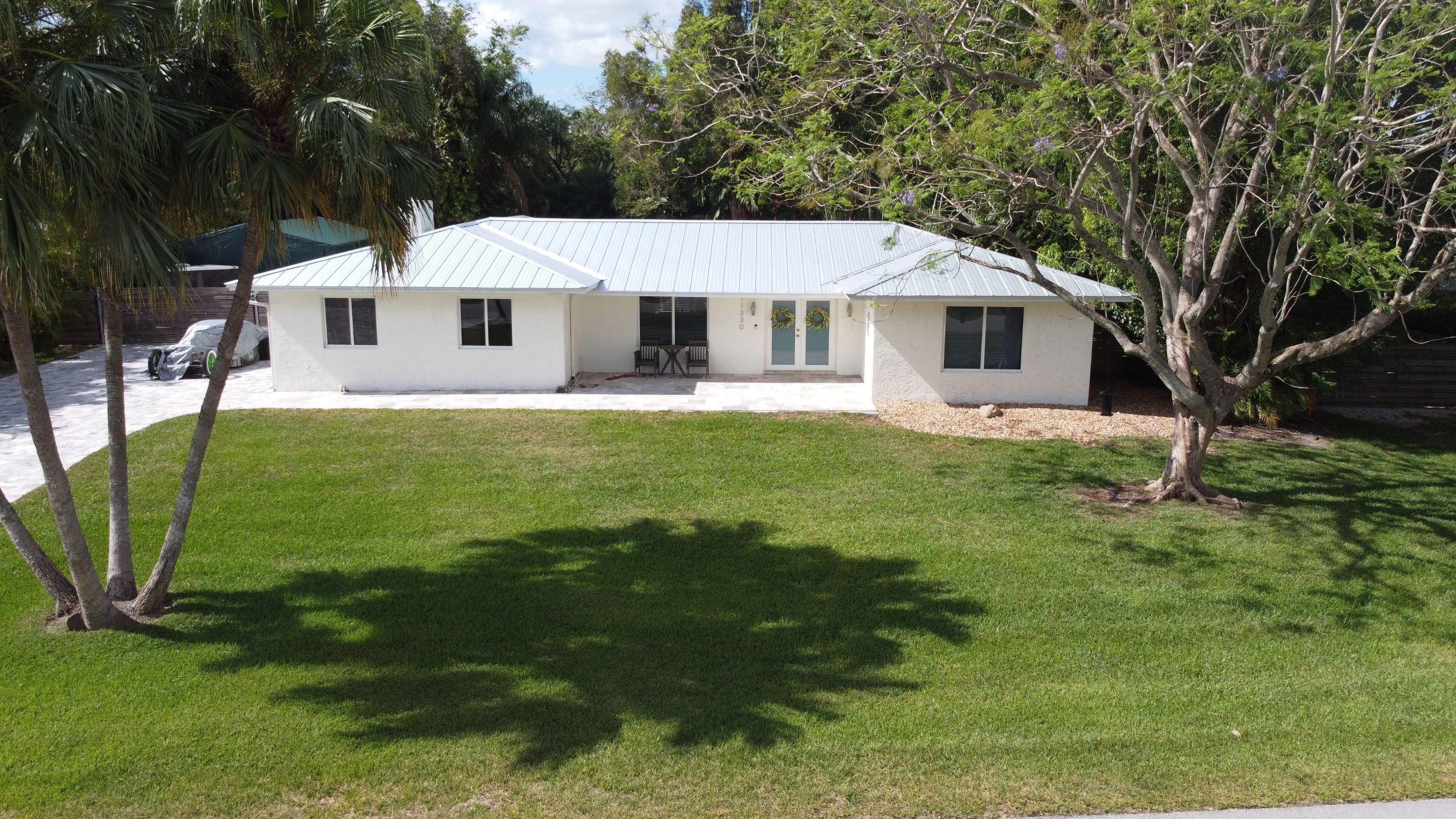 Residential Roofing Installation using 1" Nail strip metal roof by BLUES BROTHERS ROOFING