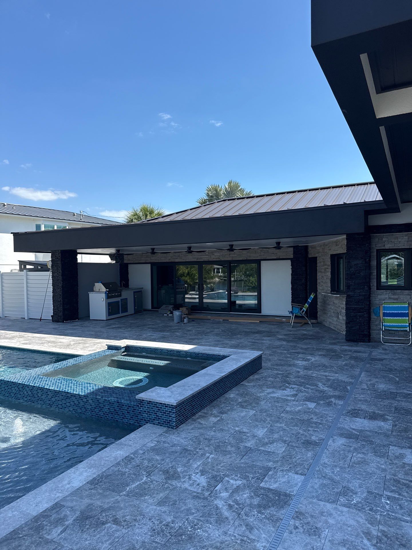 7-Inch Smooth Box Seamless Gutters using black seamless gutters in Siesta Key Fl by Gutter Professors