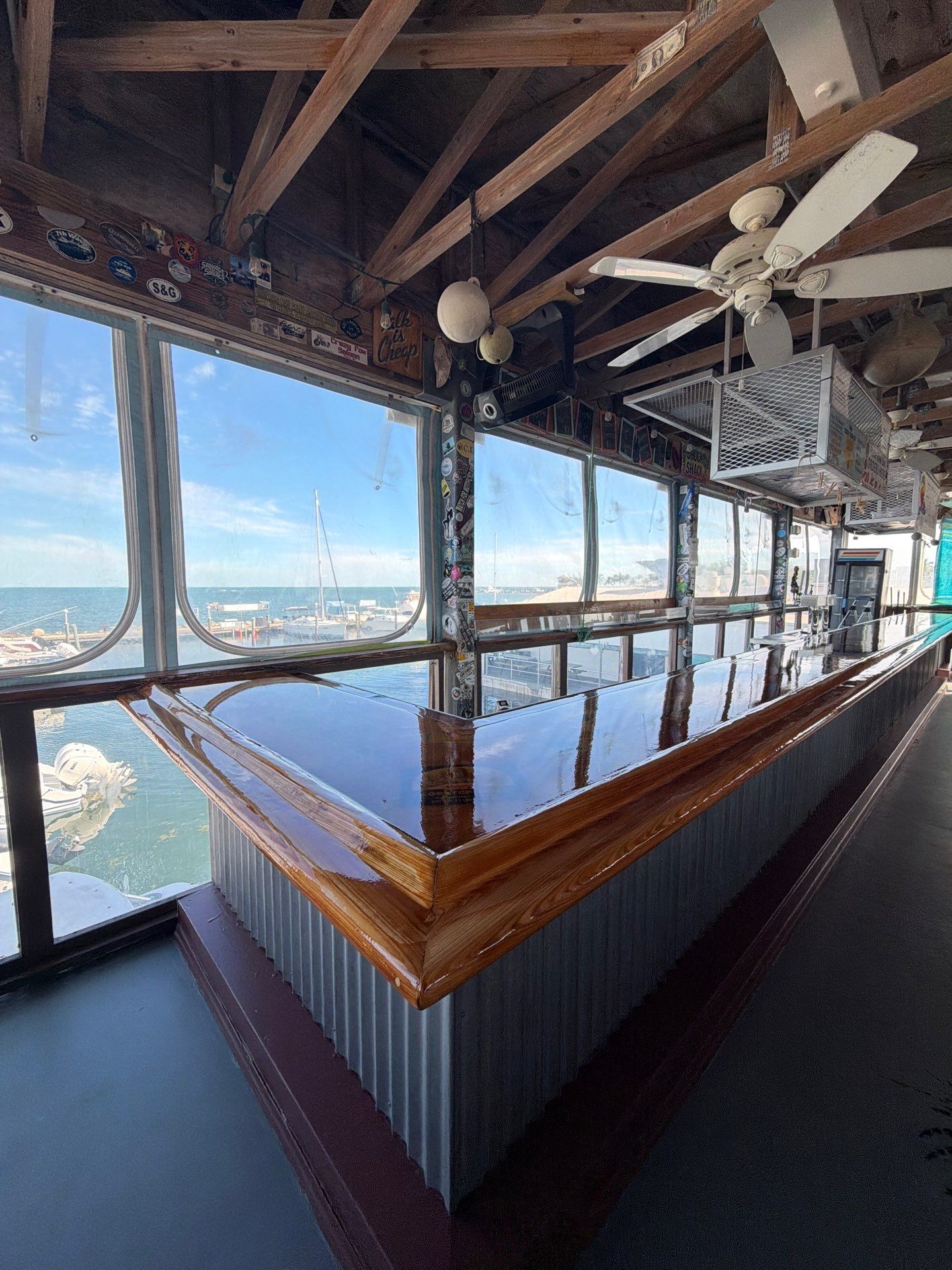 LOCAL FAMOUS FL KEYS BAR REFINISH by Tropical Epoxy Coatings & Creations LLC 