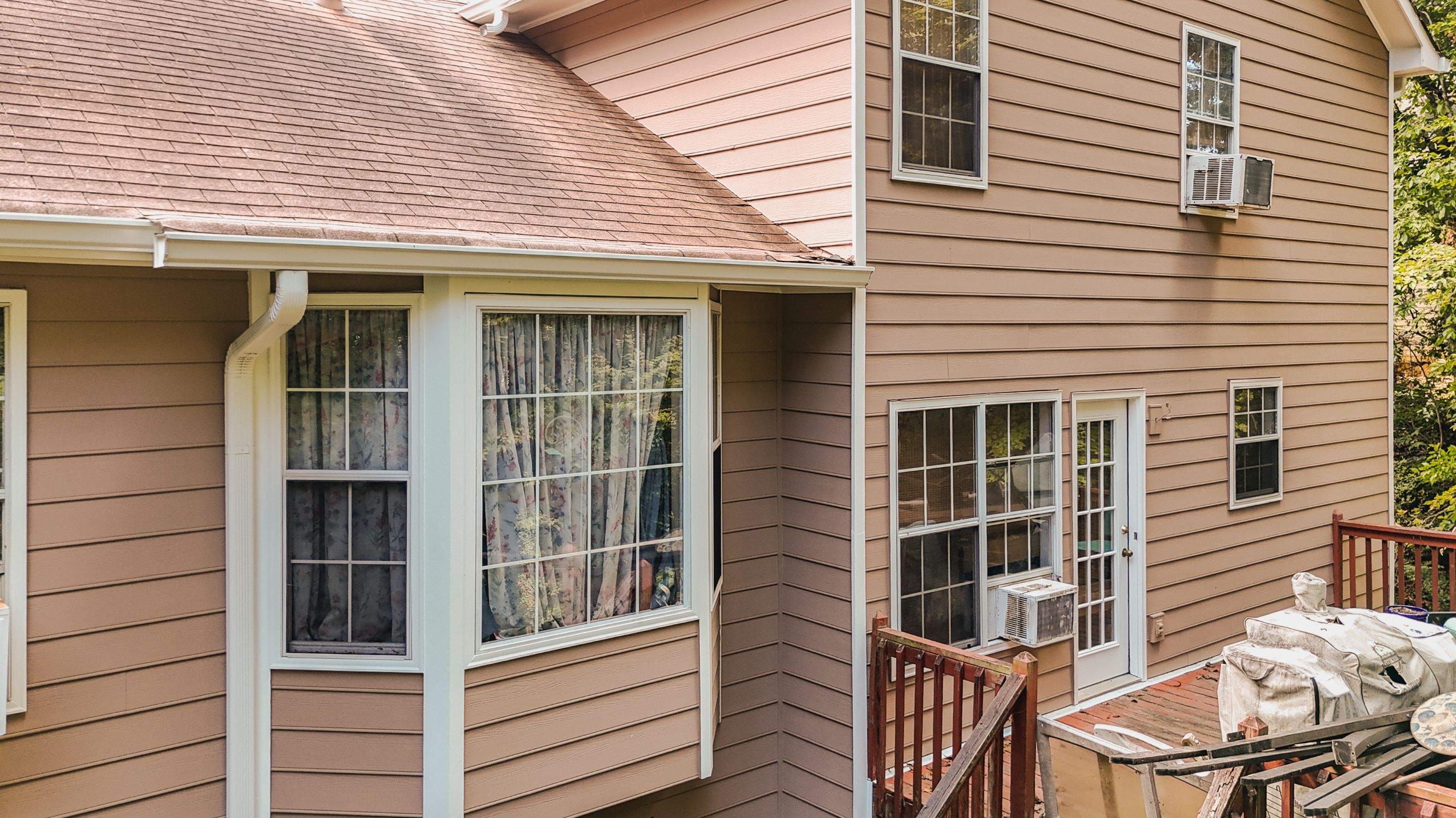 Woodstock, GA Partial Siding Replacement using James Hardie Lap Siding by Nelson Exteriors 