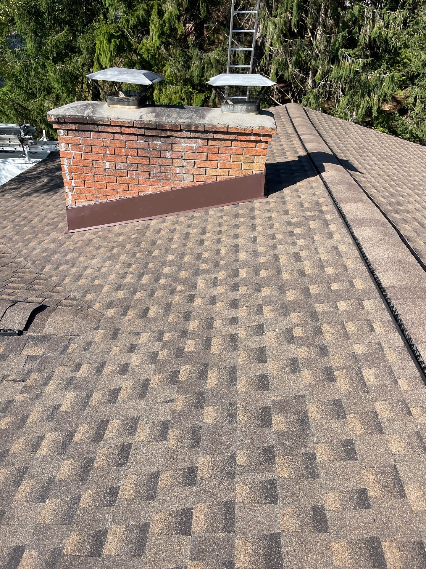 Residential Roofing Installation using GAF TImberline HDZ Hickory by Rainstoppers Roofing