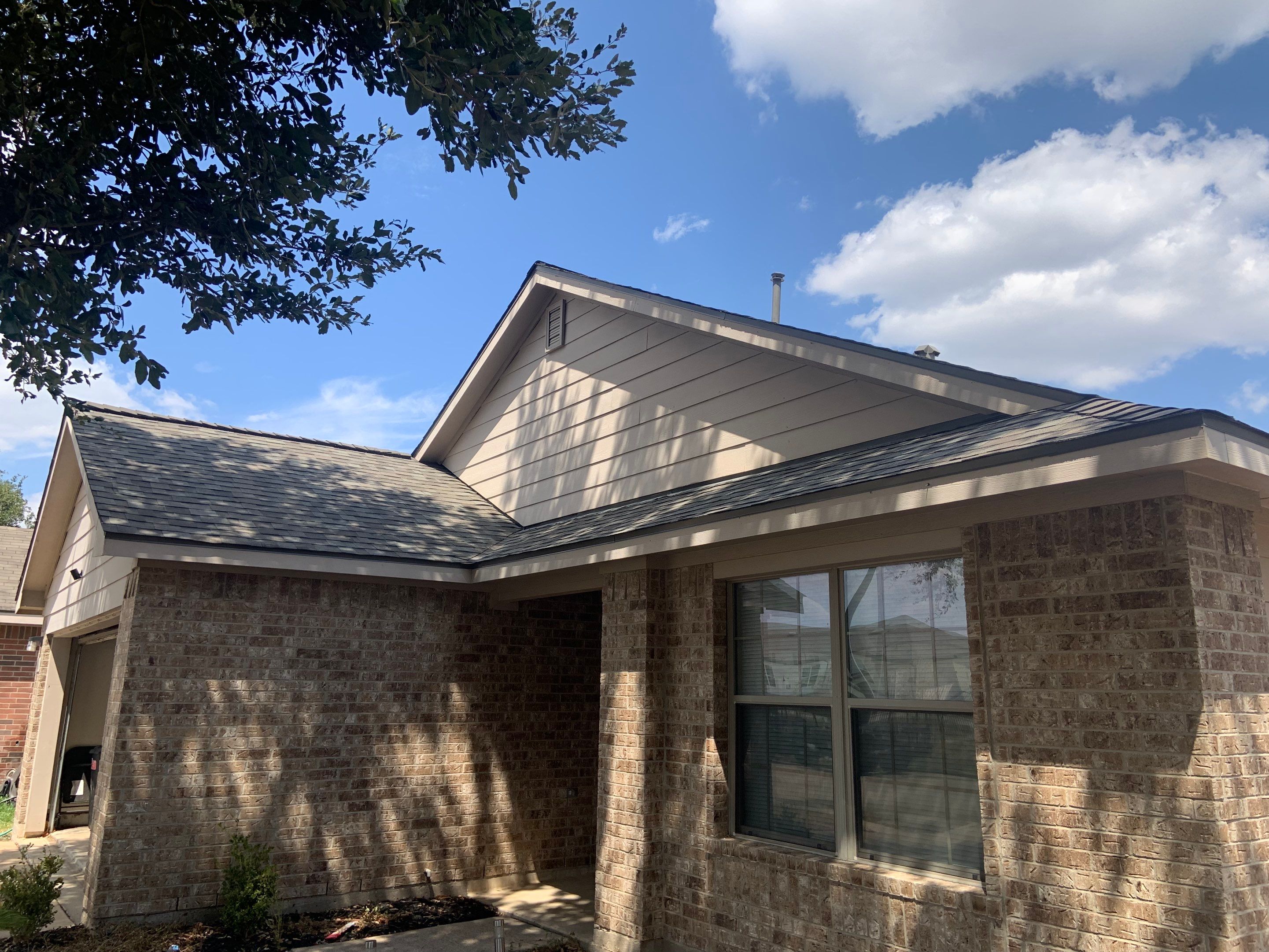 AMIG approved this roof for wind damage, fascia painting, and window work. by Roof Repair Company