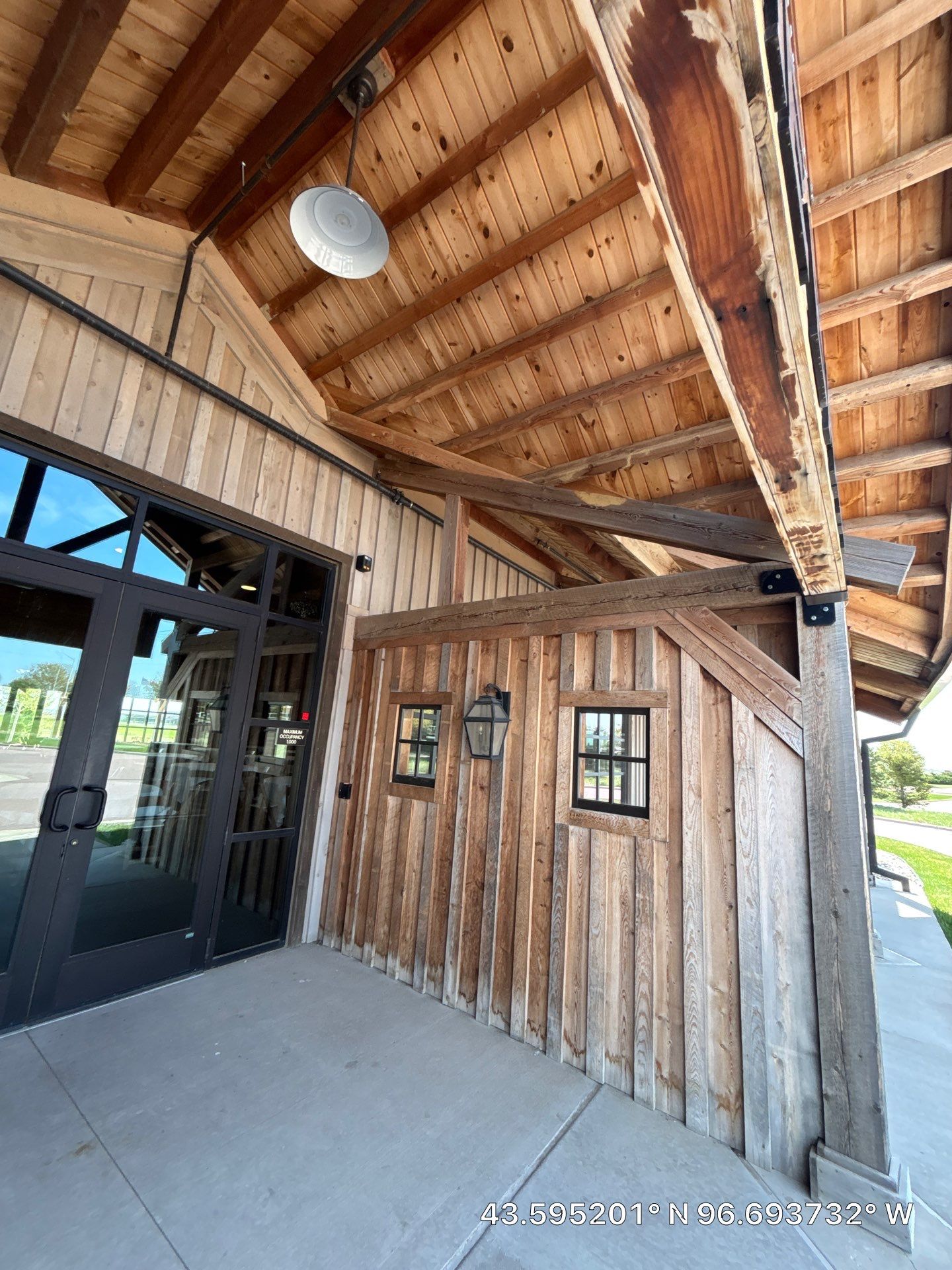 Commercial Exterior Wood Staining for Sanford Barn in Sioux Falls by Select Painting, Coatings & Garage Cabinets