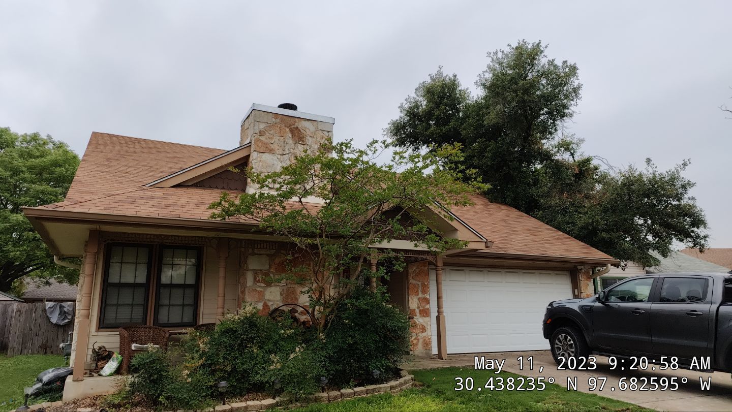 New Roof Installation Of IKO Dynasty Color Brownstone by DeZign Roofing & Exteriors