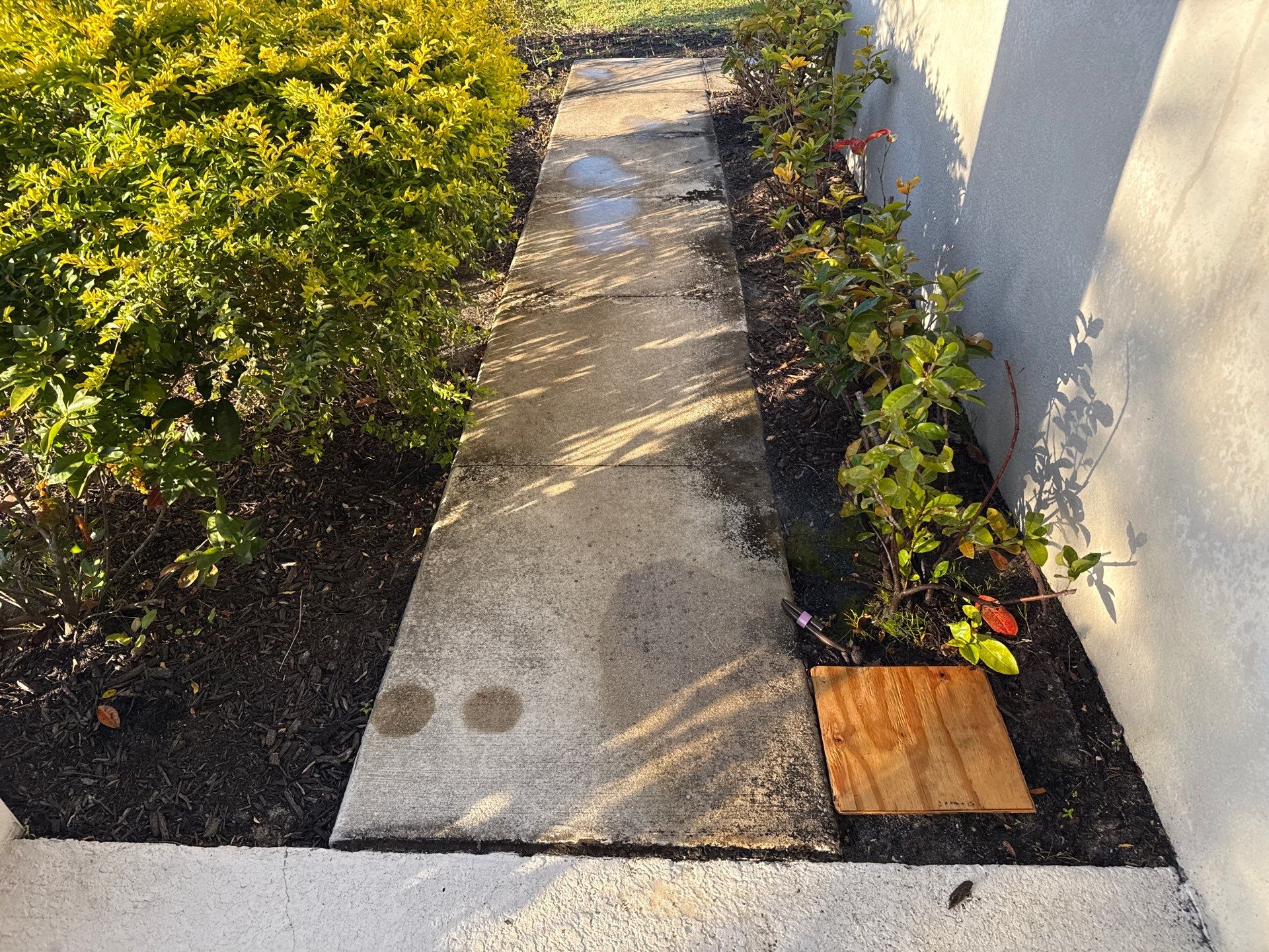 Oil Stain Removal & Concrete Cleaning – The Heights Community, Bradenton, FL by Sunshine AquaWash