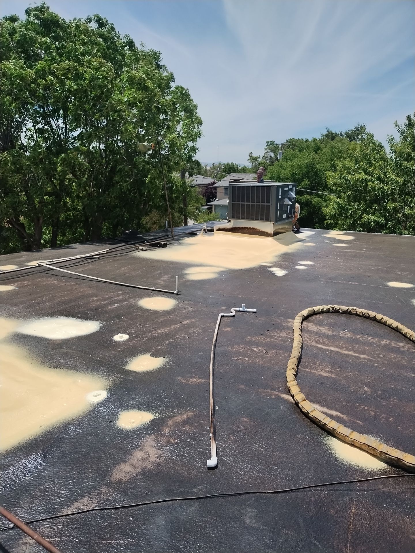 Foam Refurbish using General Coatings acrylic coatings and spray foam by Straight Edge Roofing Inc