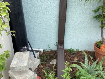 Musket Brown and New Downspouts in Lehigh Acres, FL