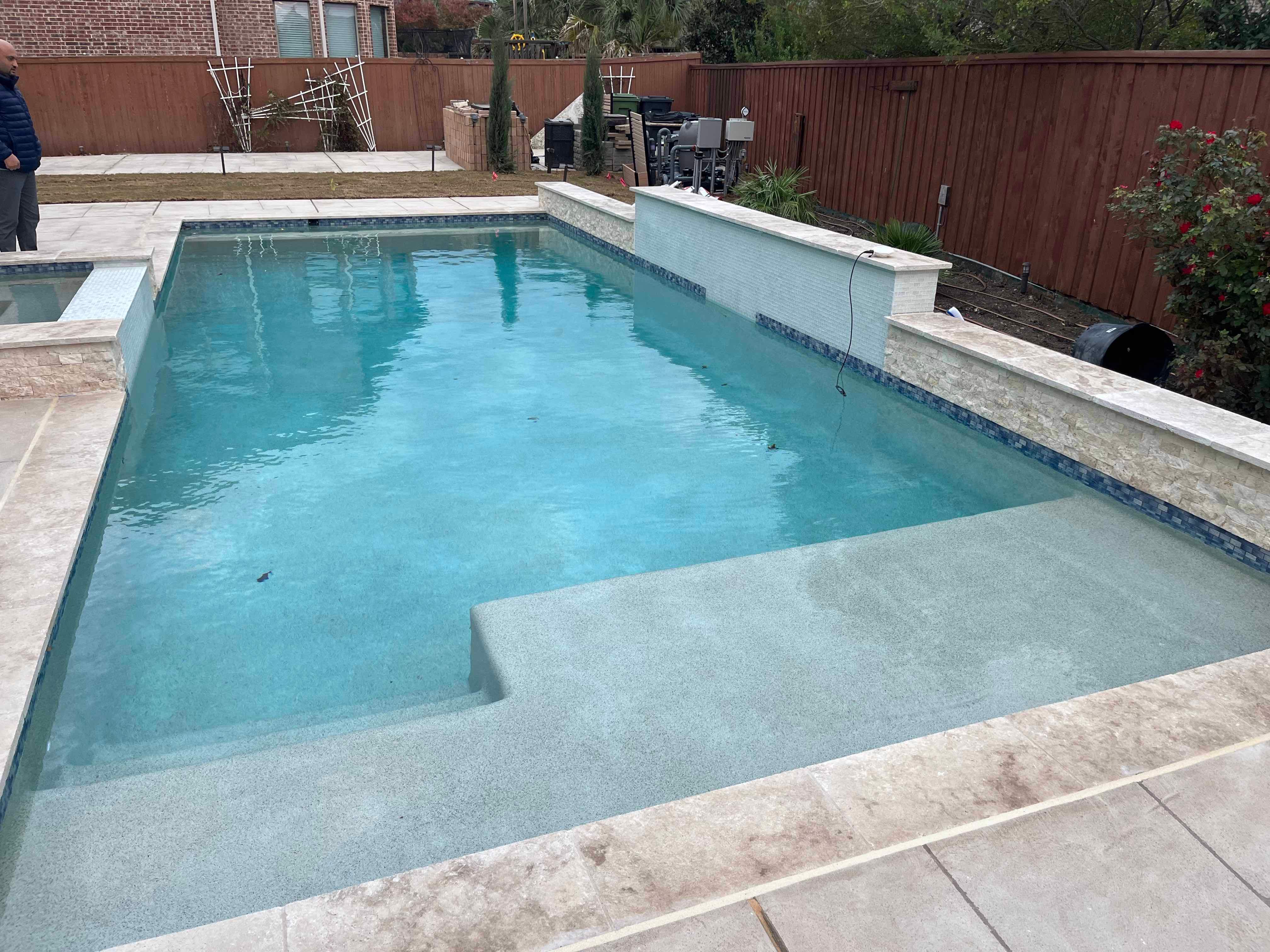 Geometric Pool with Raised Spa and Tanning Ledge by Pinnacle Pools and Spas - DFW