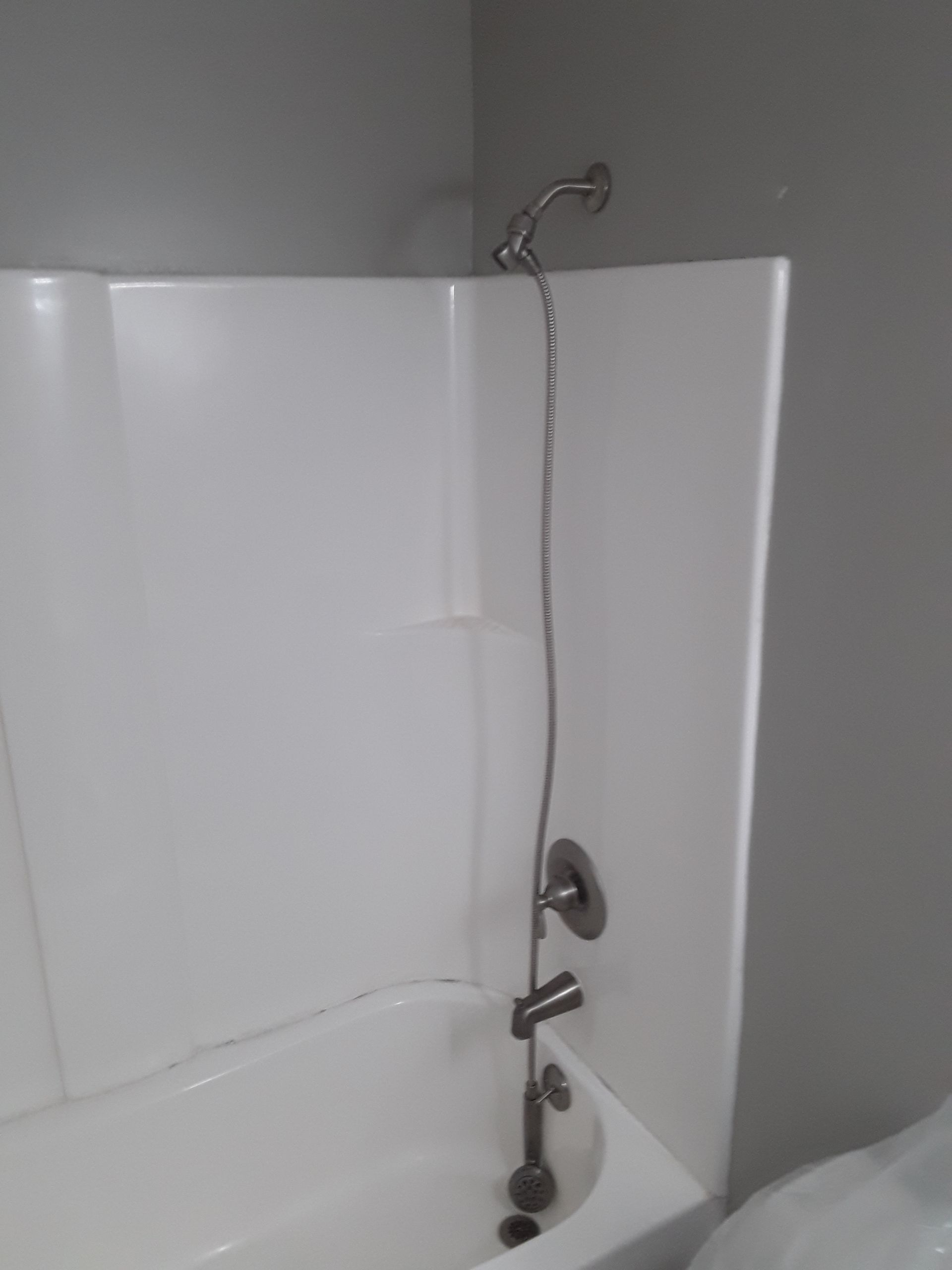 Tub to Shower Conversion using BCI Acrylic Shower System by Secure Construction Company Inc