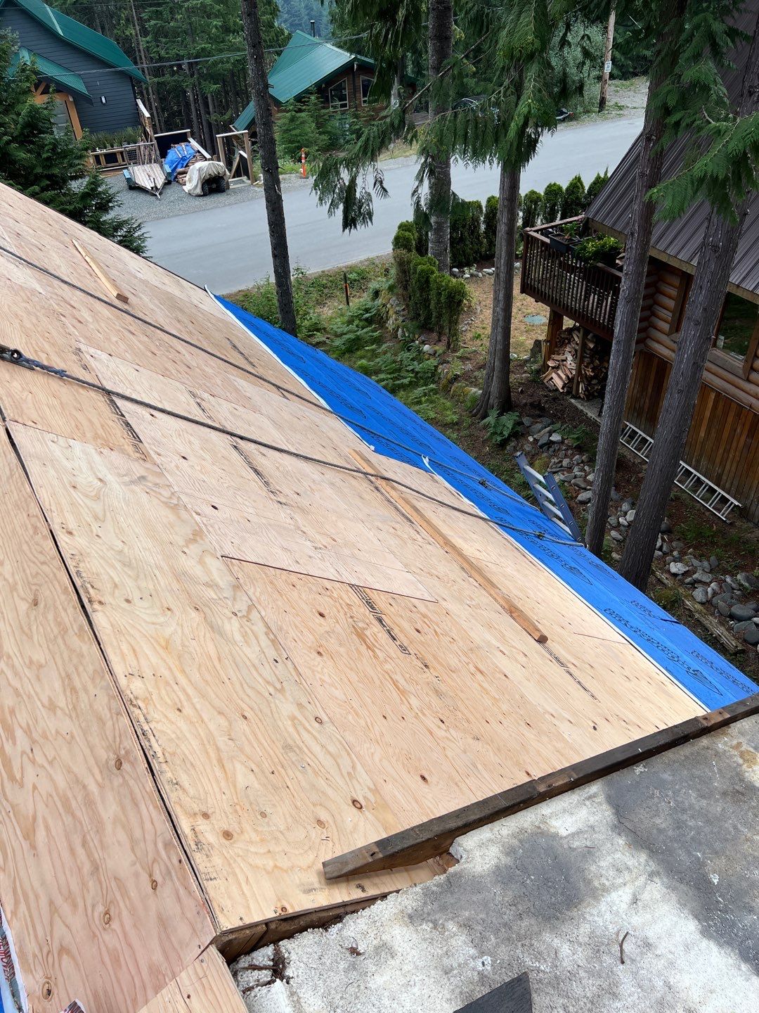 Residential ReRoofing Installation using 12" Prolok metal  by Top Notch Roofing Inc