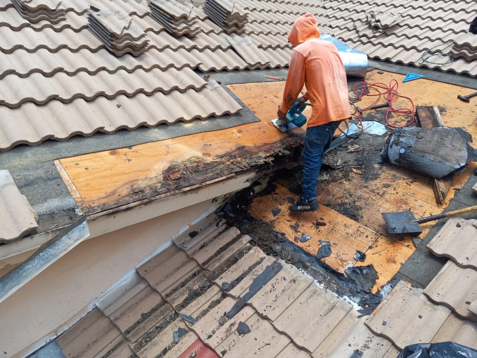 Concrete Tile Roof Leak Repair and Wood Decking Replacement in Parkland by Aastro Roofing