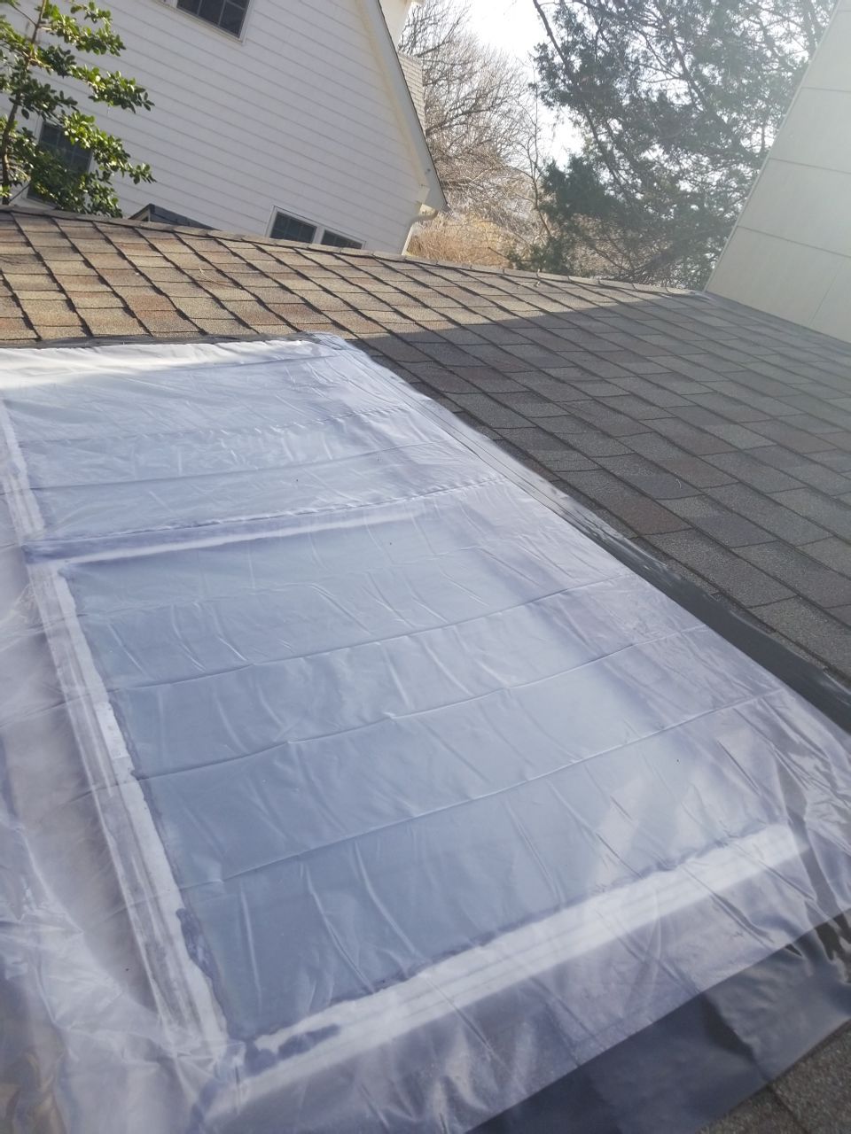 Skylight and Gutter Replacement by American Home Contractors