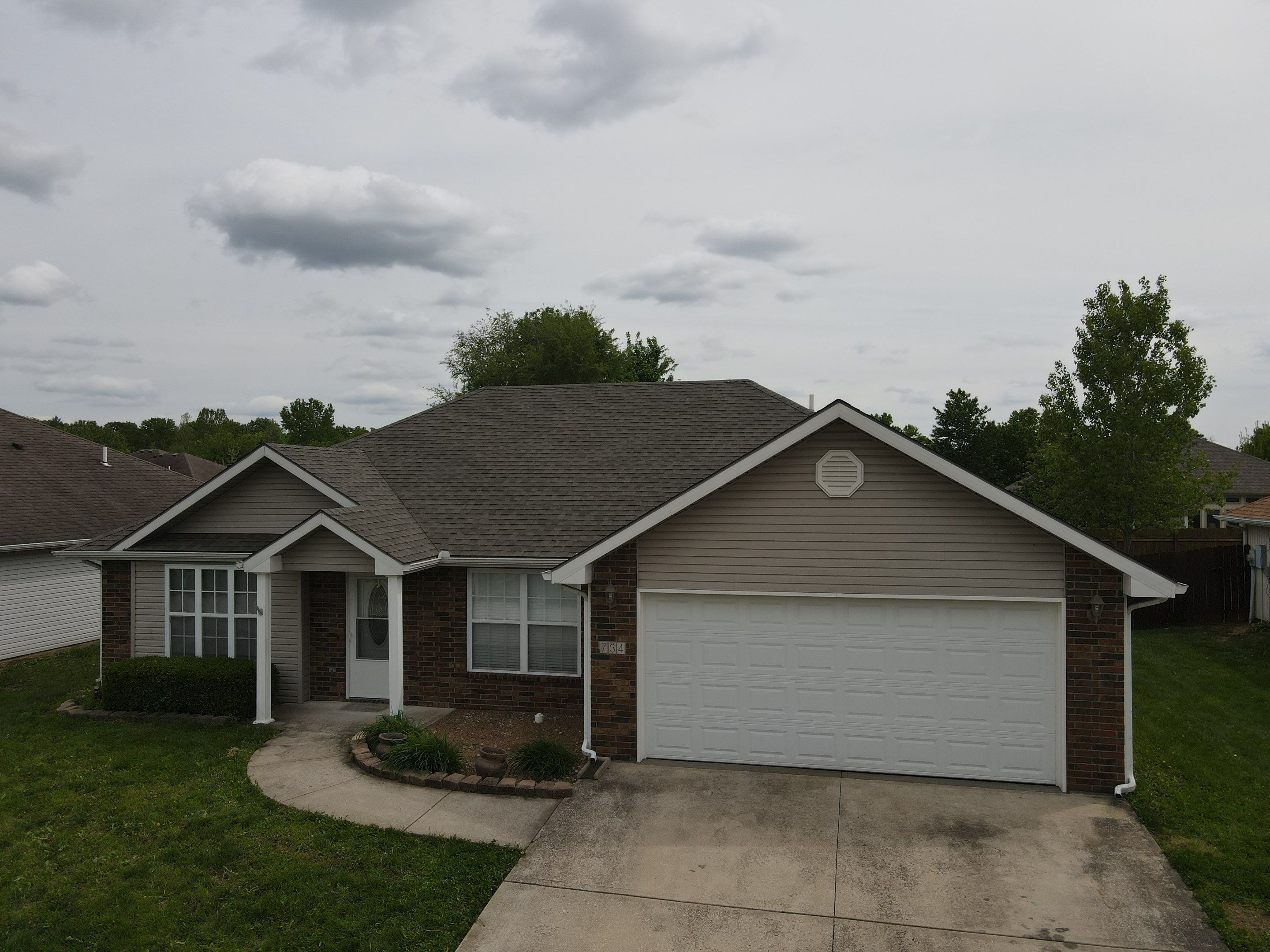 GAF Timberline HDZ Asphalt Shingle Roof Replacement in Warrensburg by Summit Roofing