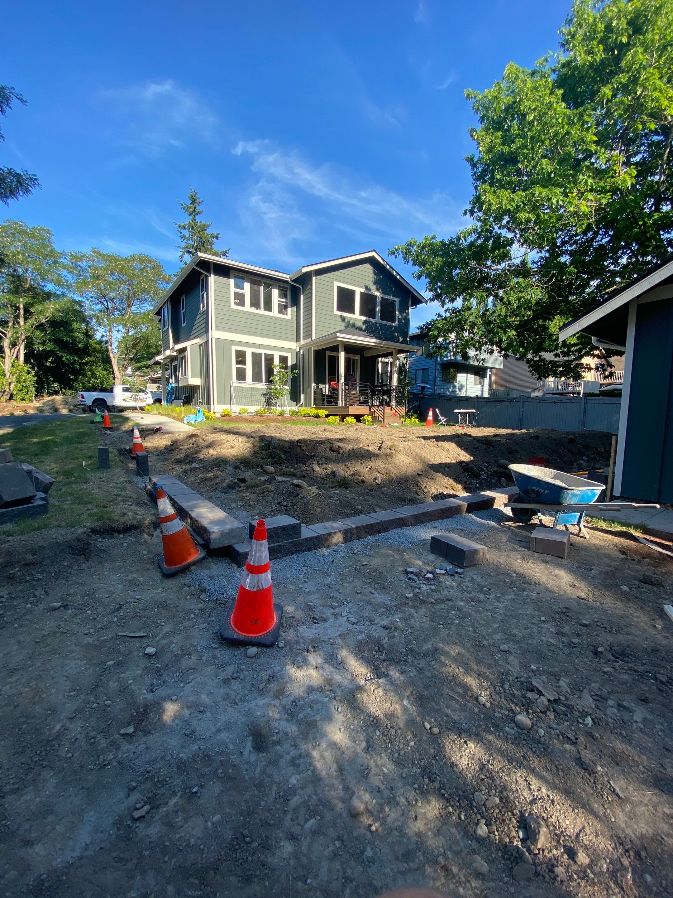 Patio Installation using Concrete, Retaining walls, and Turf install by Jireh Asphalt & Concrete Inc 