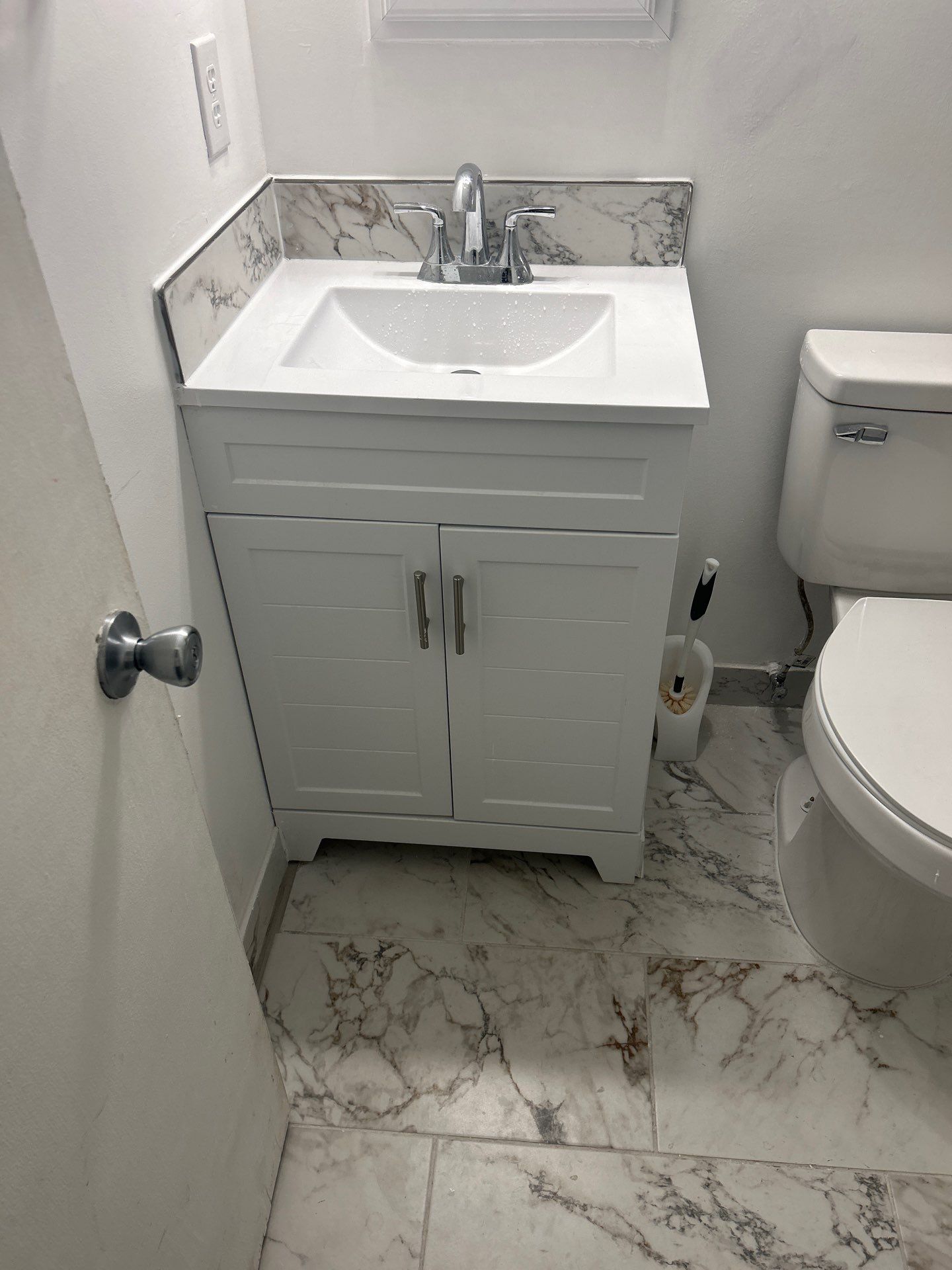 Dual Bathroom Makeover by urban green energy llc