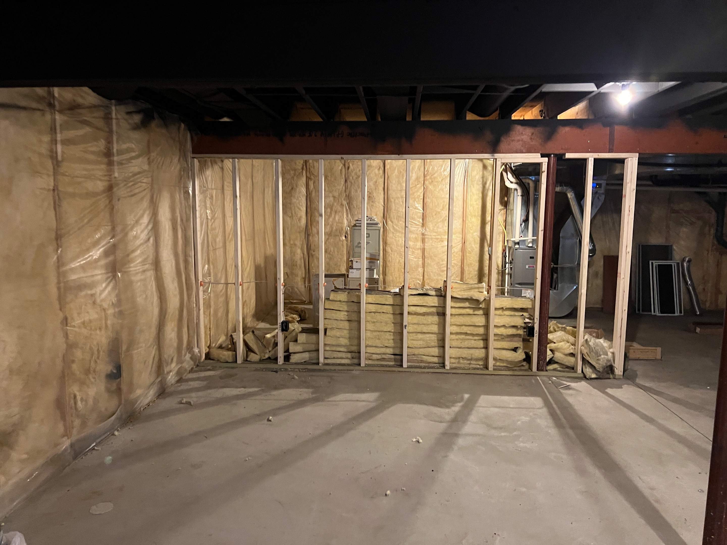 Basement Remodel w/ LVP Flooring & Exposed Ceiling by Chagnon Building & Remodeling LLC