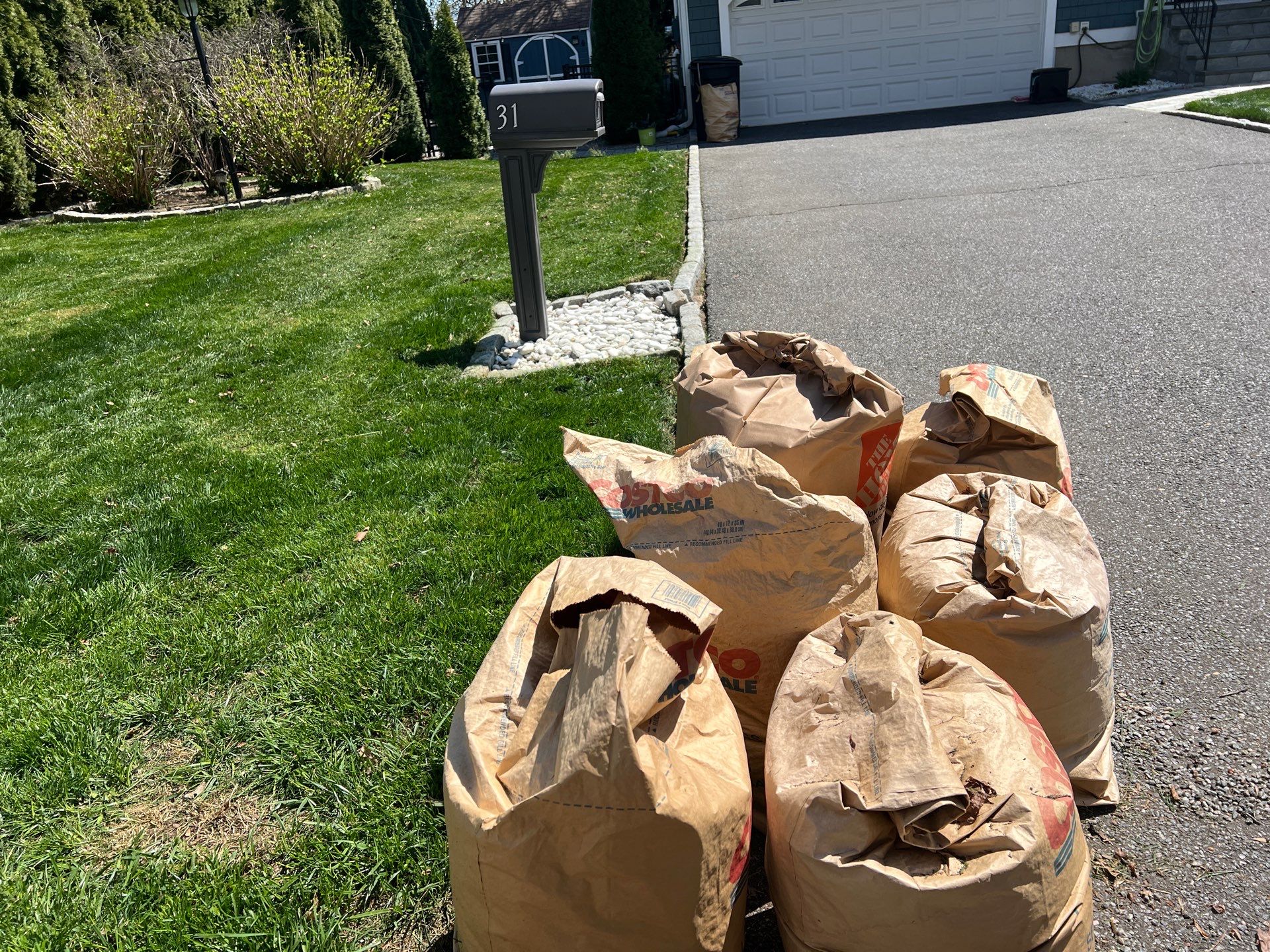 Professional Lawn Care and Landscape Maintenance in Milford by Diamond Image LLC