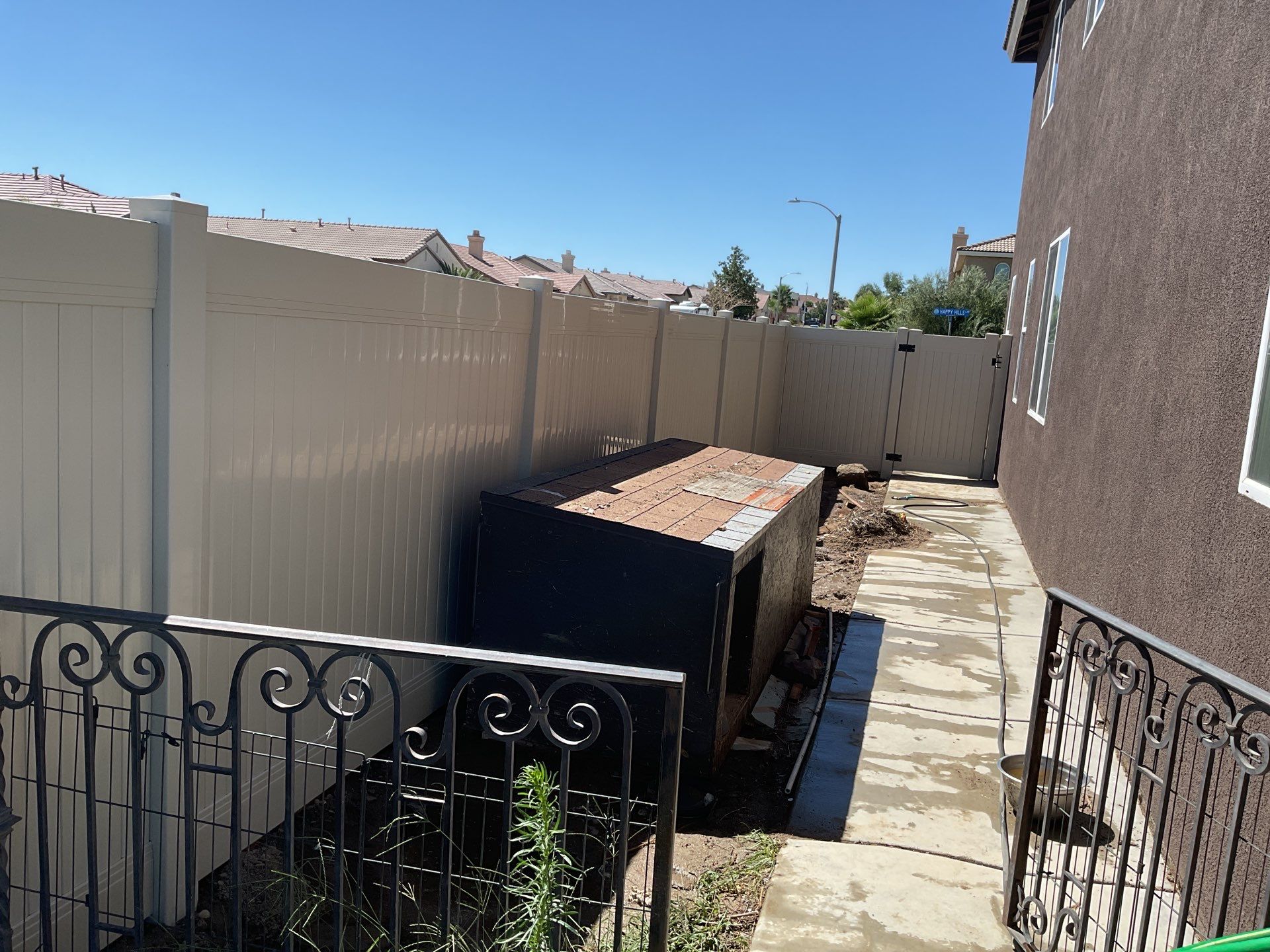 Tan Vinyl by Fence Guys Inc. 