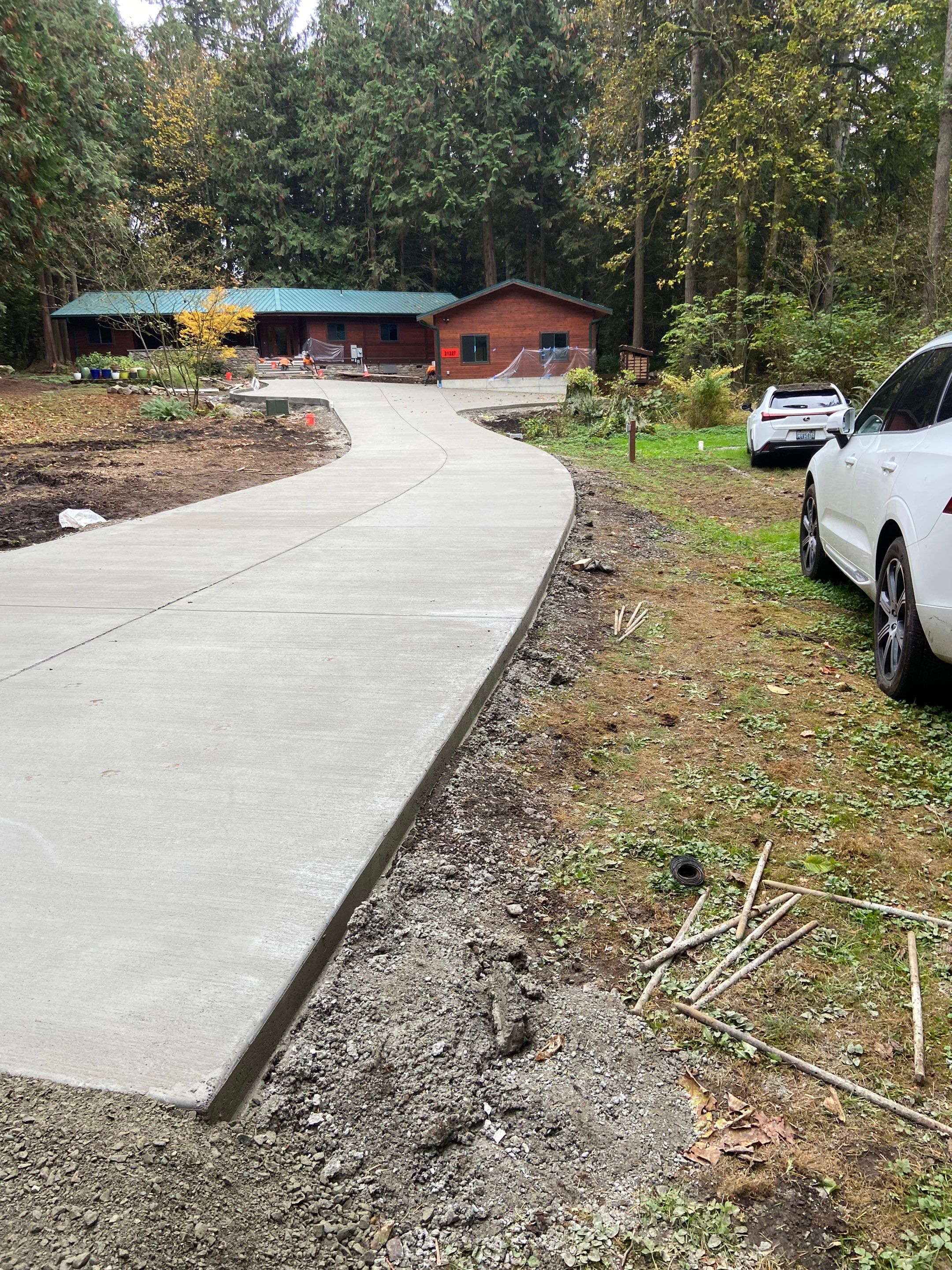 Pia | Custom Concrete Driveway, Walkway & Floating Steps by Jireh Asphalt & Concrete Inc 
