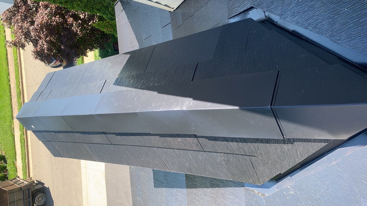 Tesla Solar Roof Replacement using Tesla Solar Roof V3 tiles by American Home Contractors
