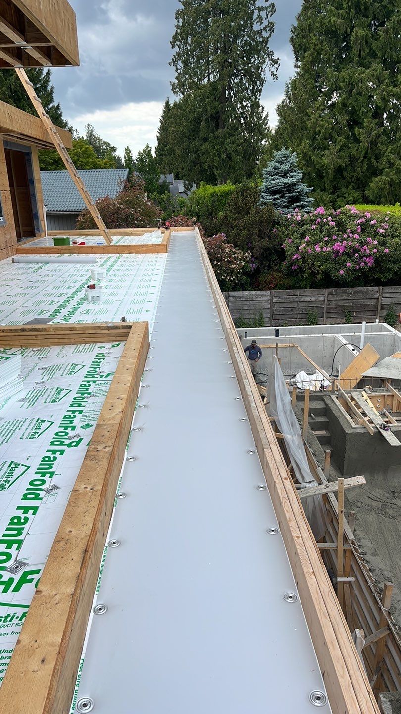 Residential Roofing Installation using Durolast roofing membrane by Top Notch Roofing Inc