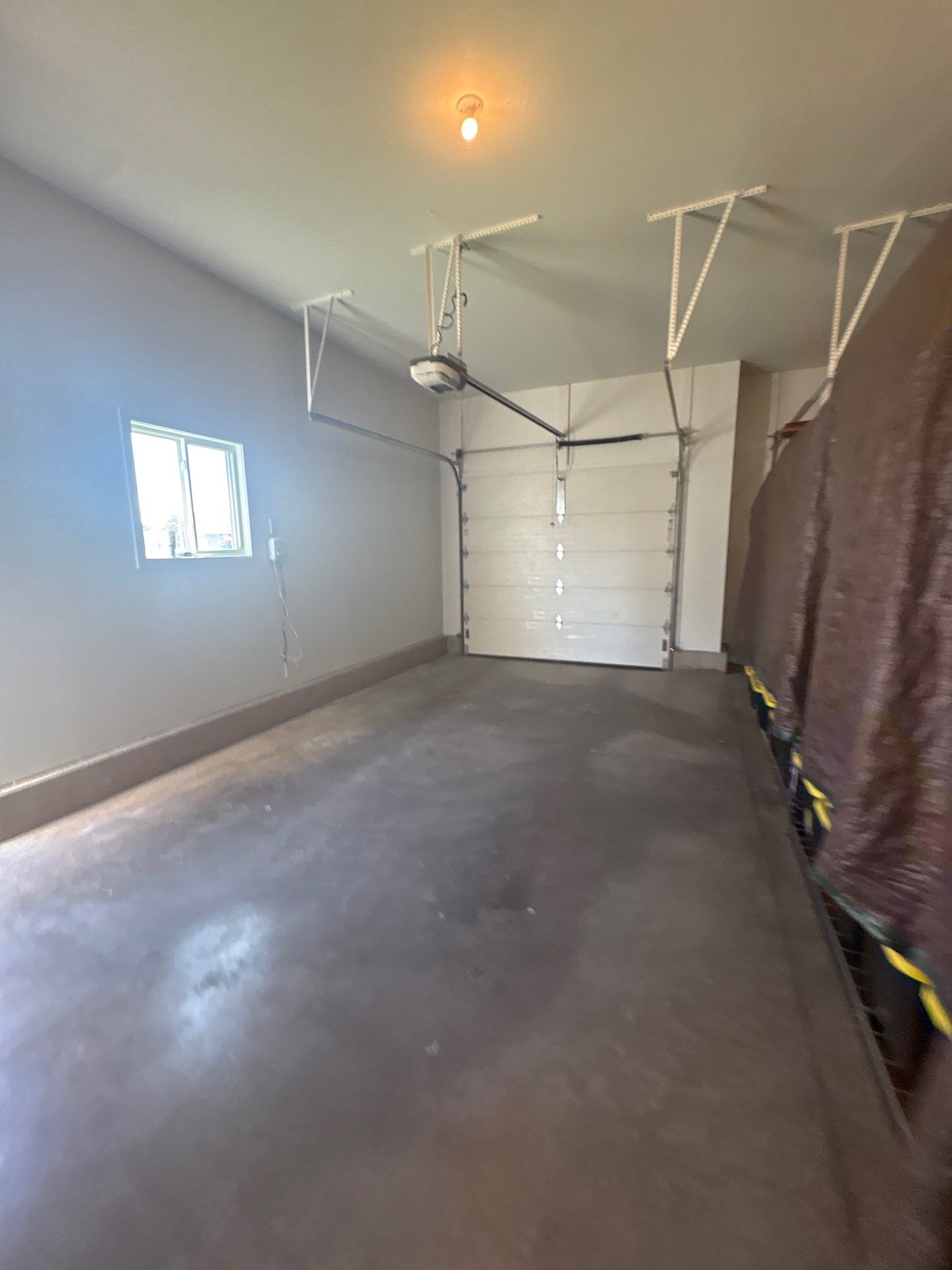Full Garage Interior Drywall Finishing and Priming in Sioux Falls by Select Painting, Coatings & Garage Cabinets