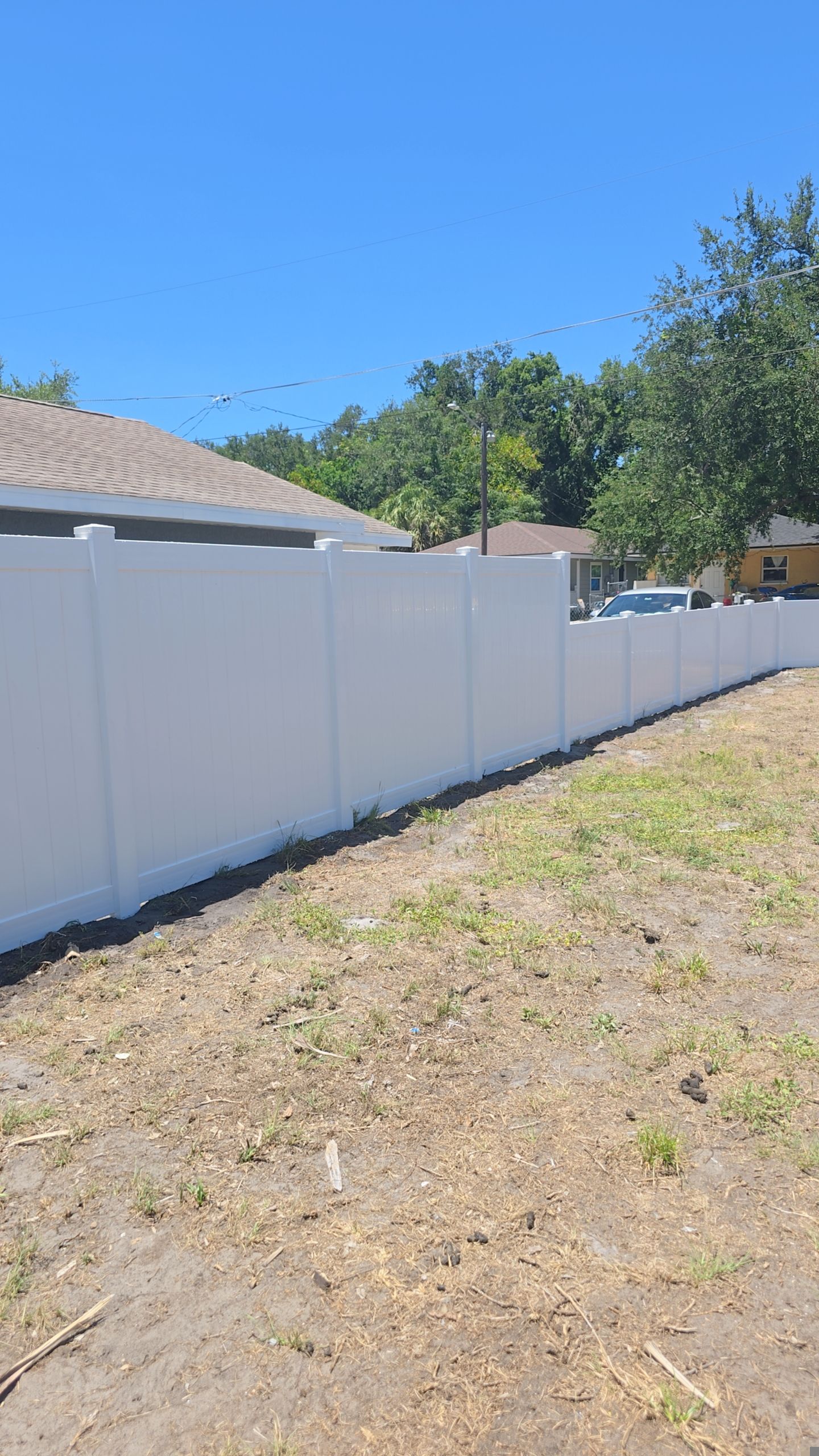 White Vinyl Privacy Fence and Gate Installation in Bradenton by True Fence LLC