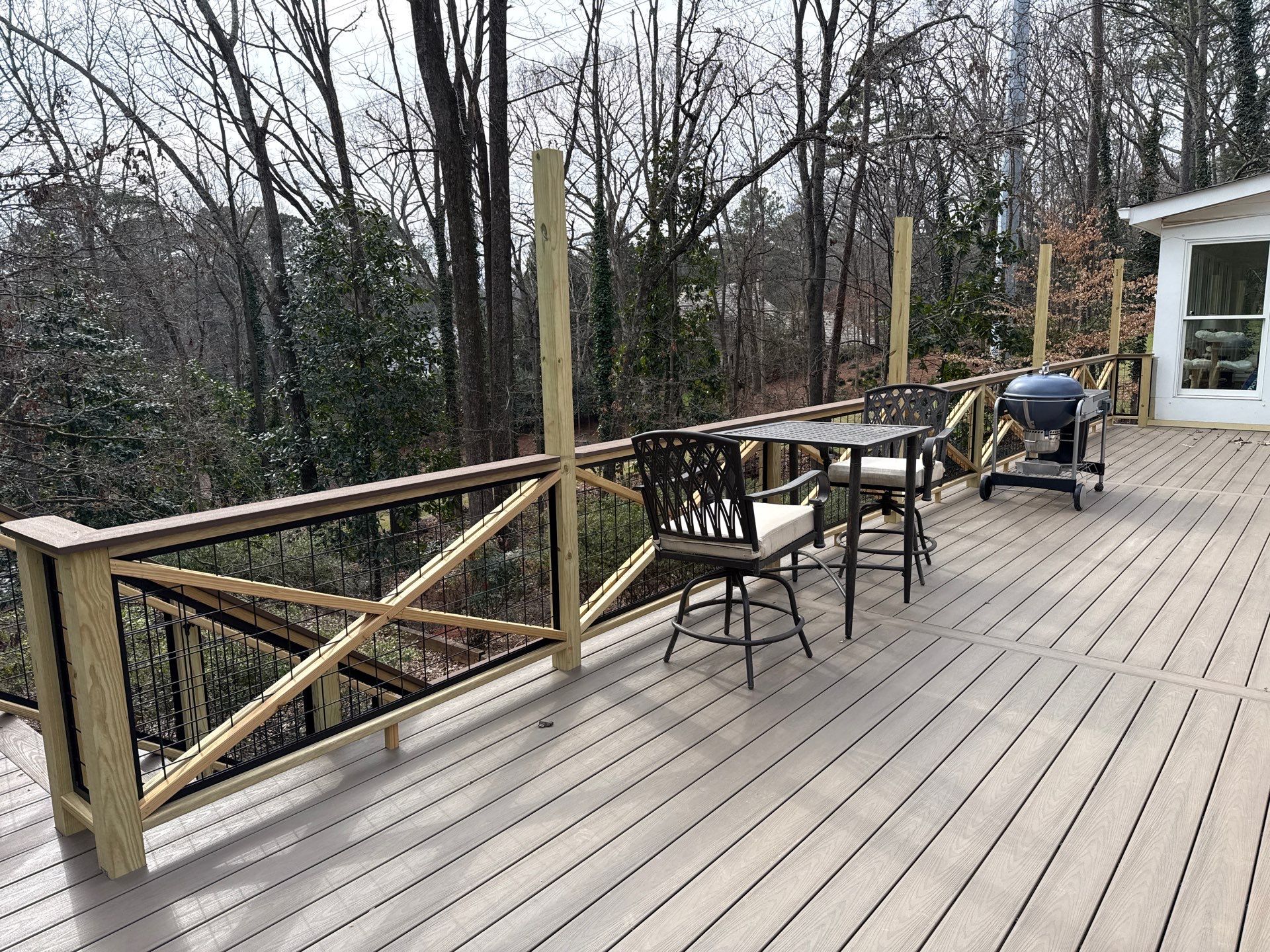 Deck Build and Screened-In Porch Install with Wild Hog 6' Black Mesh Panel Railing by Nelson Exteriors