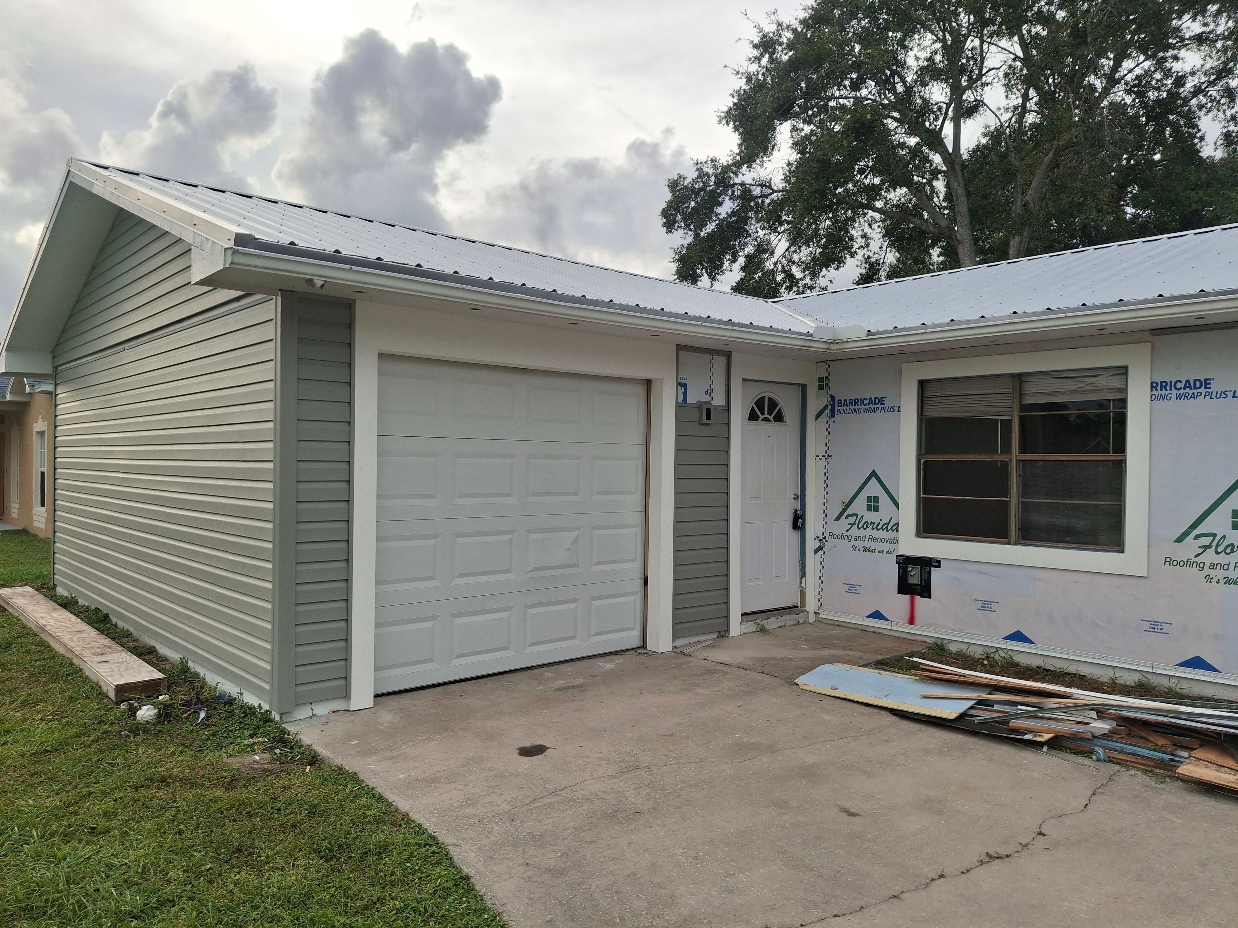 Vinyl Siding Installation and Structural Wood Rot Repair in Palm Bay by Florida Roofing and Renovations Inc.