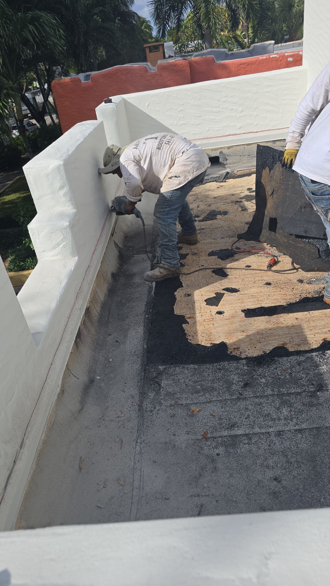 West Palm Beach Roof Restoration and Travertine Paver Driveway Installation by Aastro Roofing