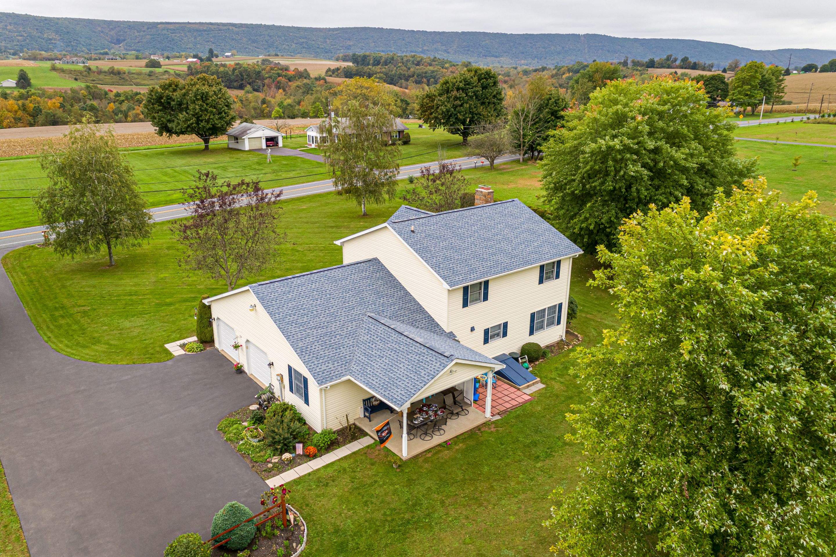 Shingle Roof-biscayne blue- and windows by Esh Builders